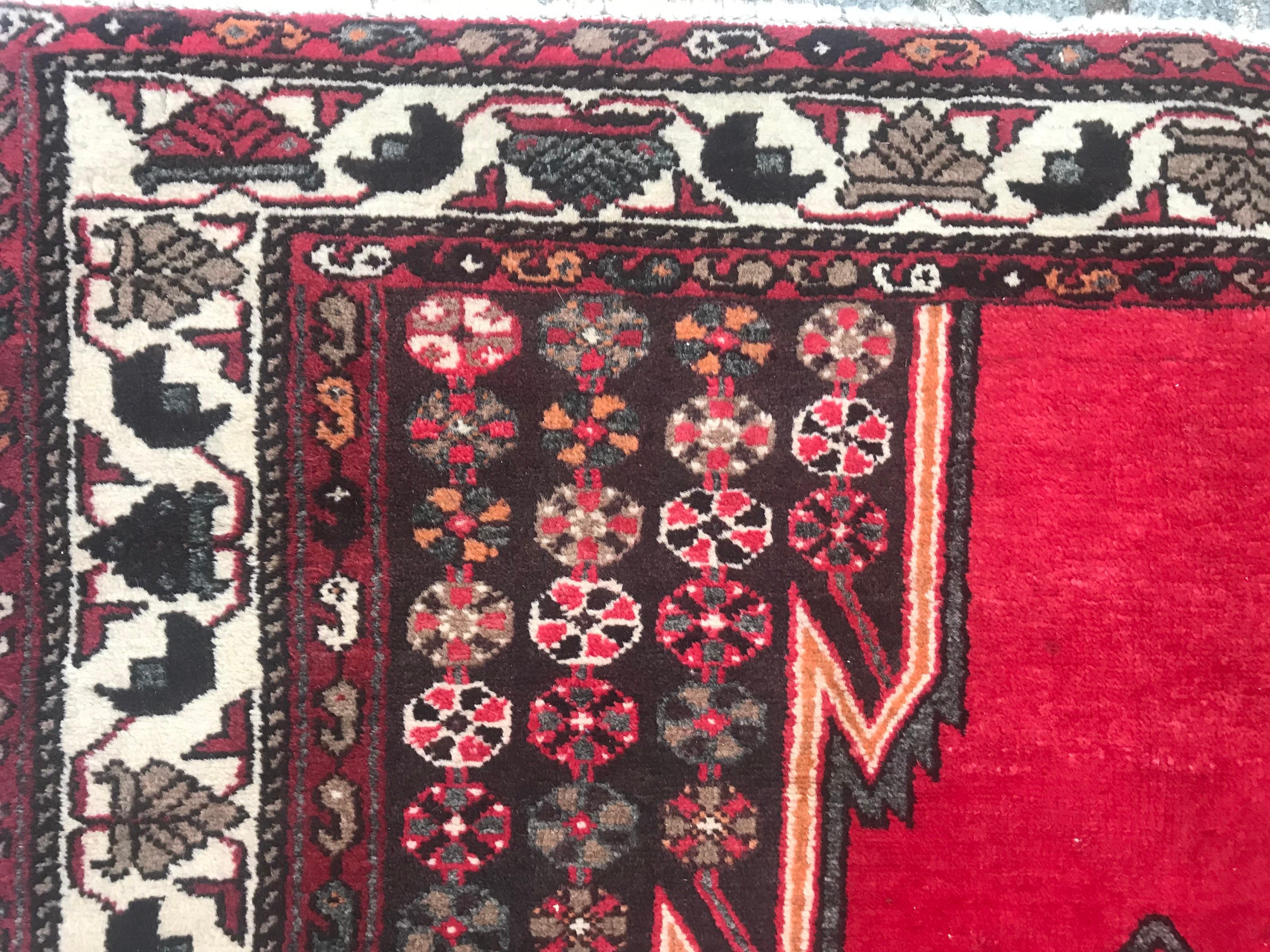 Nice mid-20th century rug with beautiful geometrical design and red field colors with green and pink, entirely hand knotted with wool on cotton foundation.

✨✨✨
