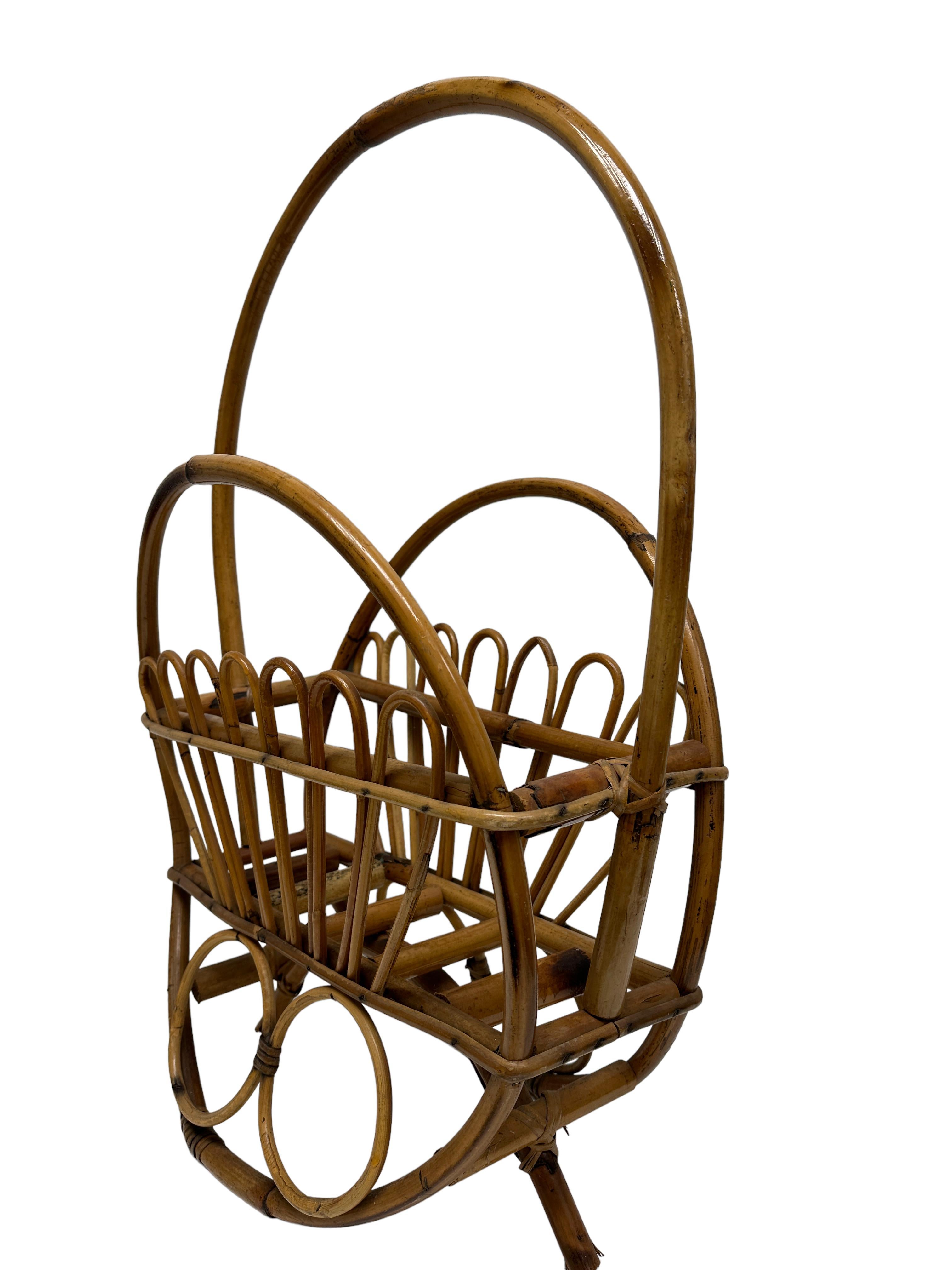 Offered is an absolutely stunning, 1970s Italian magazine rack stand. Original midcentury era. Minor patina gives this piece a classy statement. Attributed to Vivai Del Sud, fount at an Estate sale in Modena, Italy.