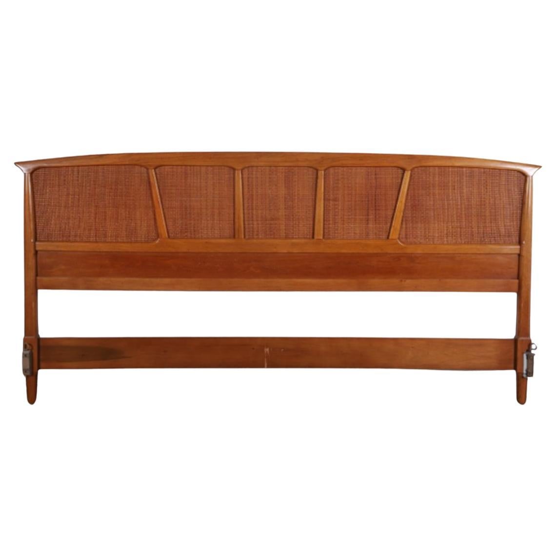 Beautiful walnut sculpted cane King size bed headboard by Tomlinson For Sale