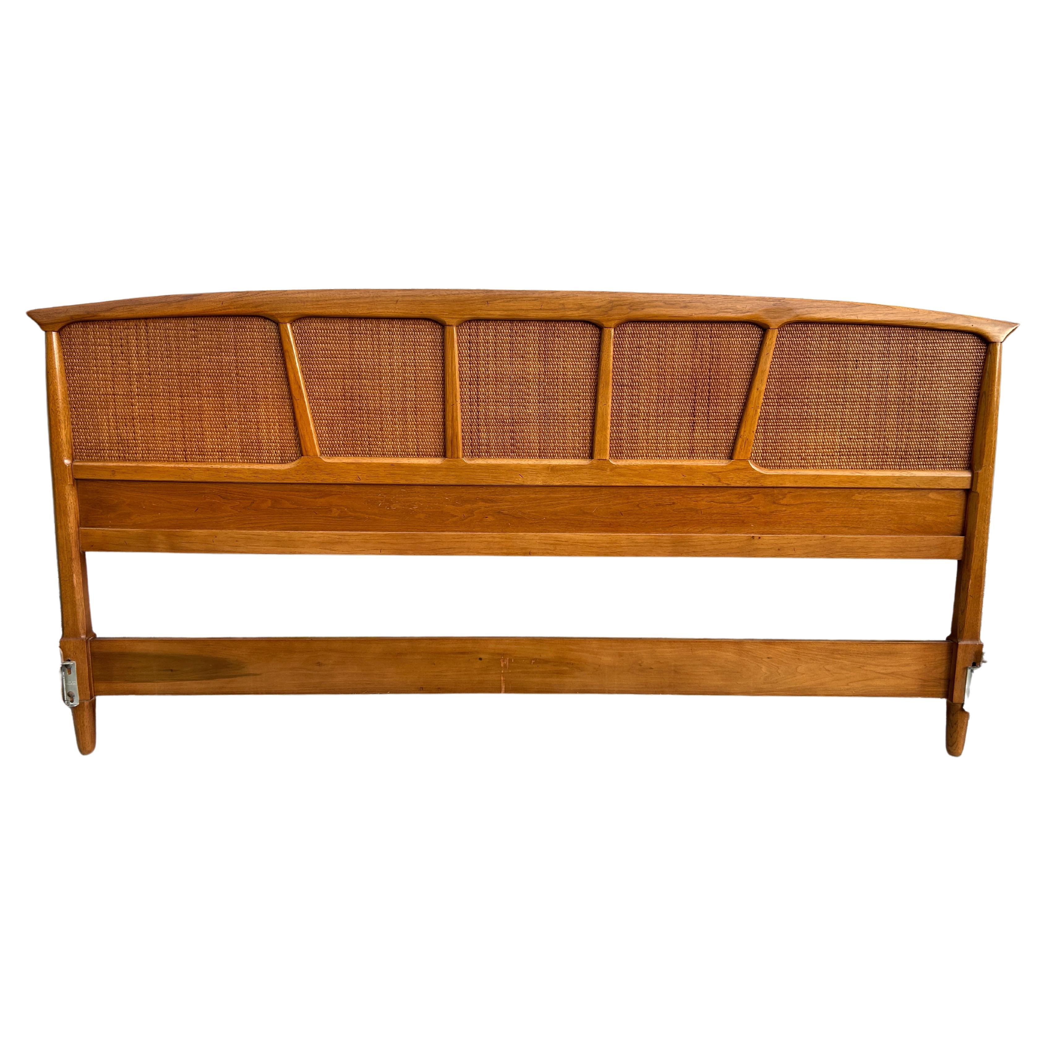 Beautiful walnut sculpted cane King size bed headboard by Tomlinson For Sale