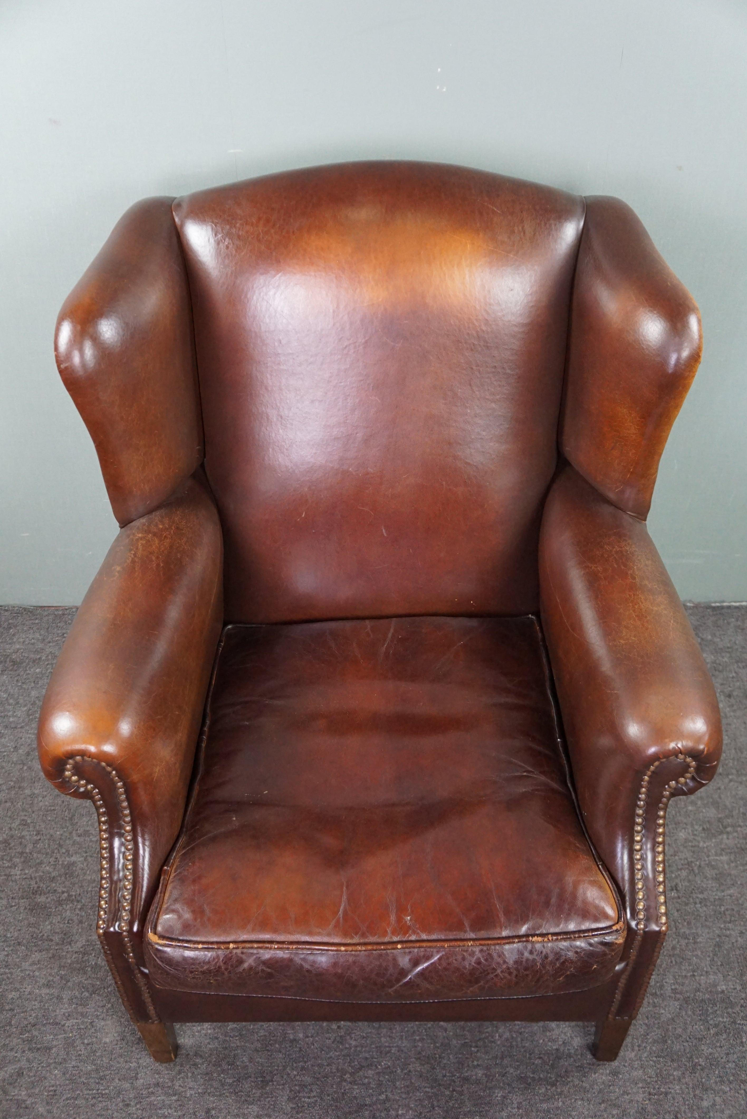 Beautiful warm-colored sheep leather wing chair For Sale 1