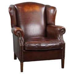 Retro Beautiful warm-colored sheep leather wing chair