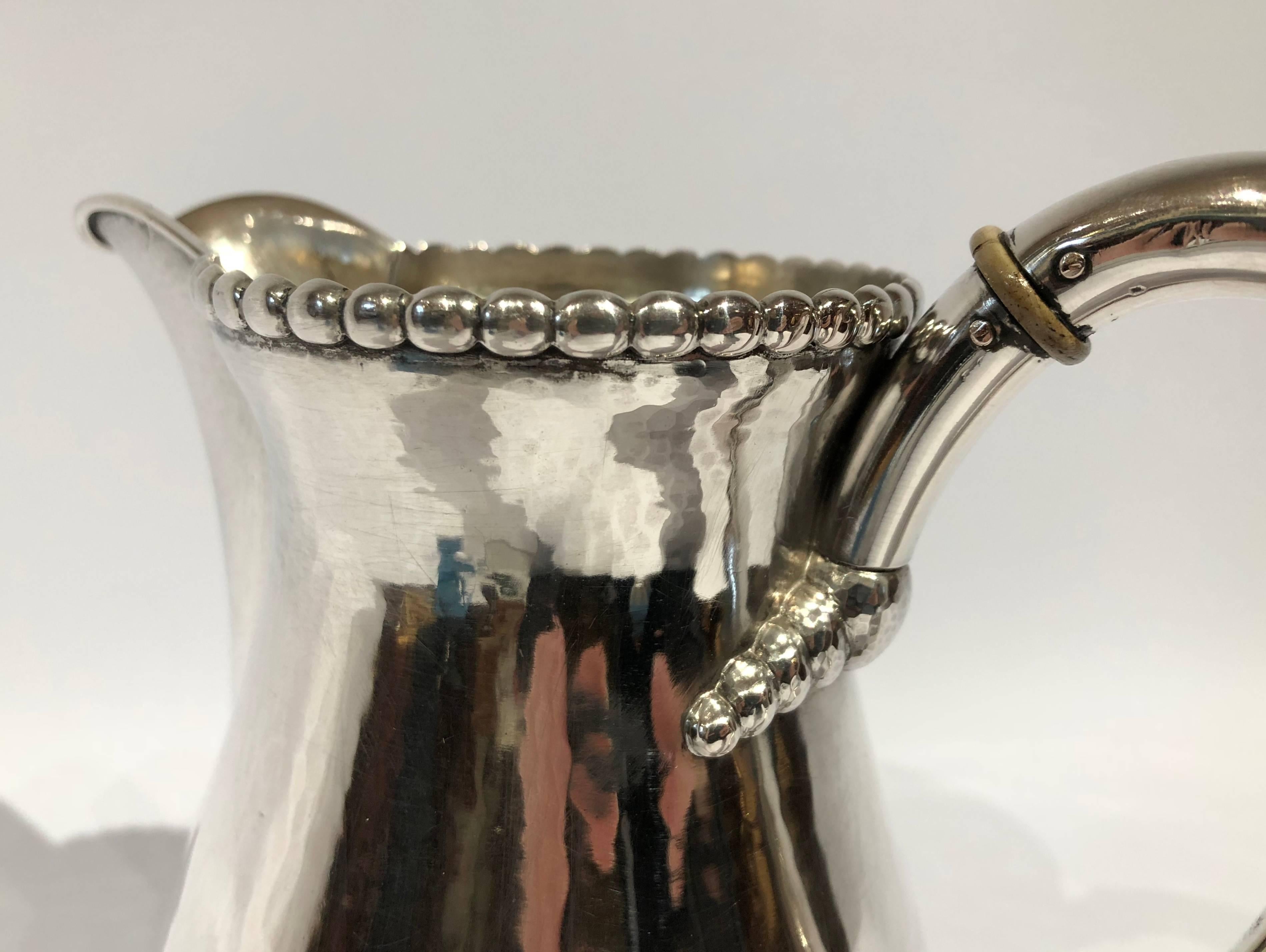 Danish Beautiful Water Jug in Hammered Hallmarked Silver and Simple Pearl Edge For Sale