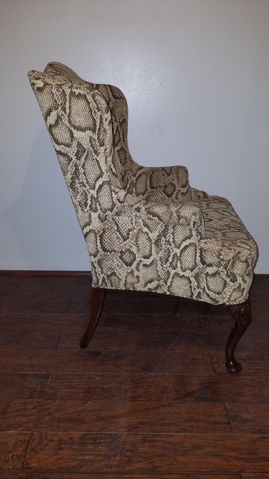 Beautiful wing back single accent chair with rare Pyton snake cotton fabric. Adds a very distinctive style to any installation. Perfect for a bedroom.