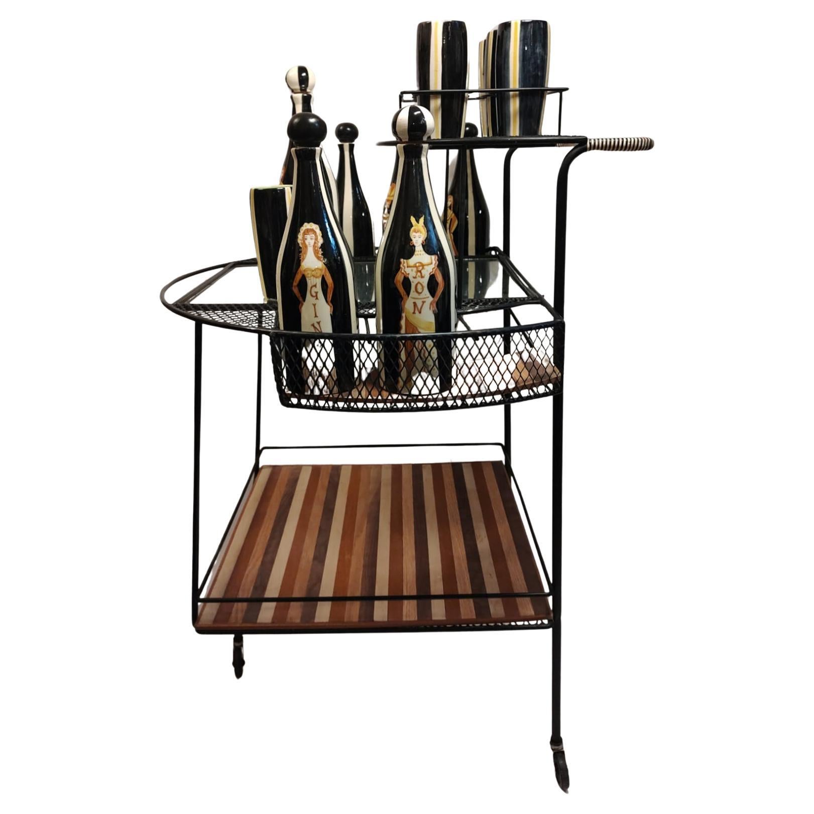 Beautiful Wrought Iron Bar Cart with Original Set of Ceramic Bottles and Glasses For Sale