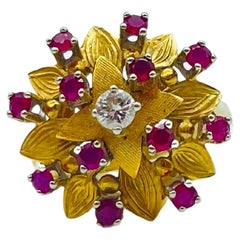 beautiful yellow gold flower ring with rubies and diamond