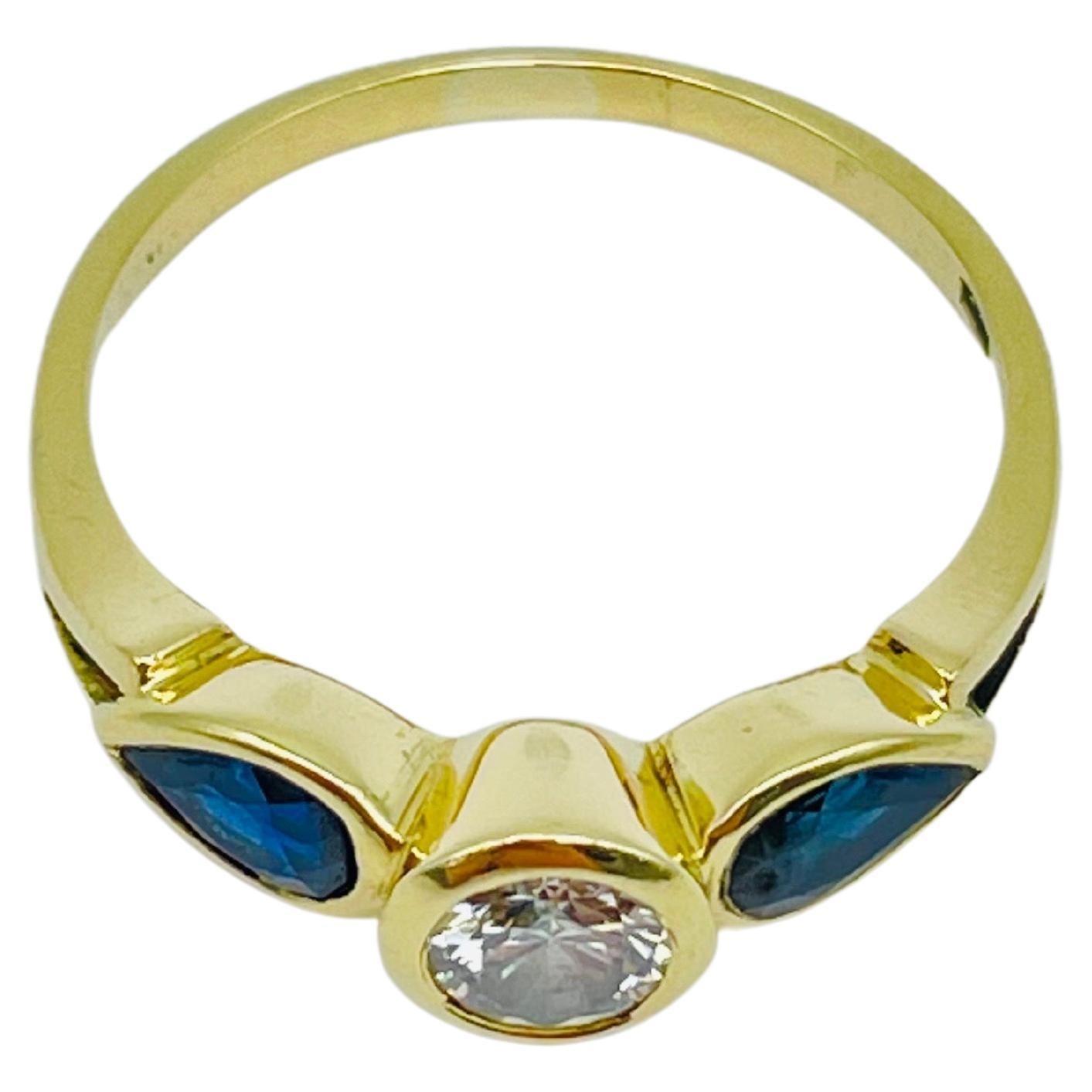 Beautiful yellow gold ring 0.60carat diamond, 2 blue sapphire teardrops For Sale 4