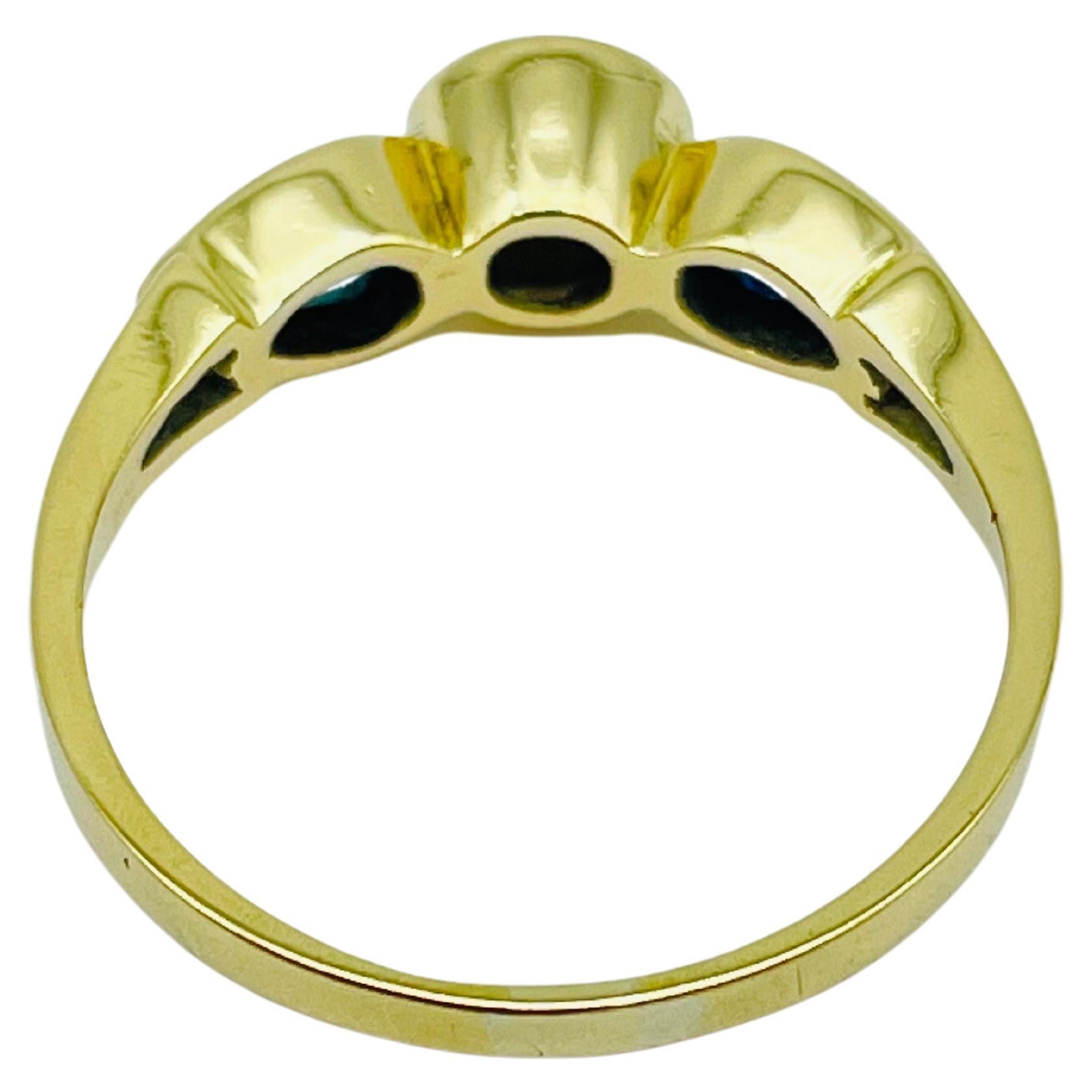 Aesthetic Movement Beautiful yellow gold ring 0.60carat diamond, 2 blue sapphire teardrops For Sale