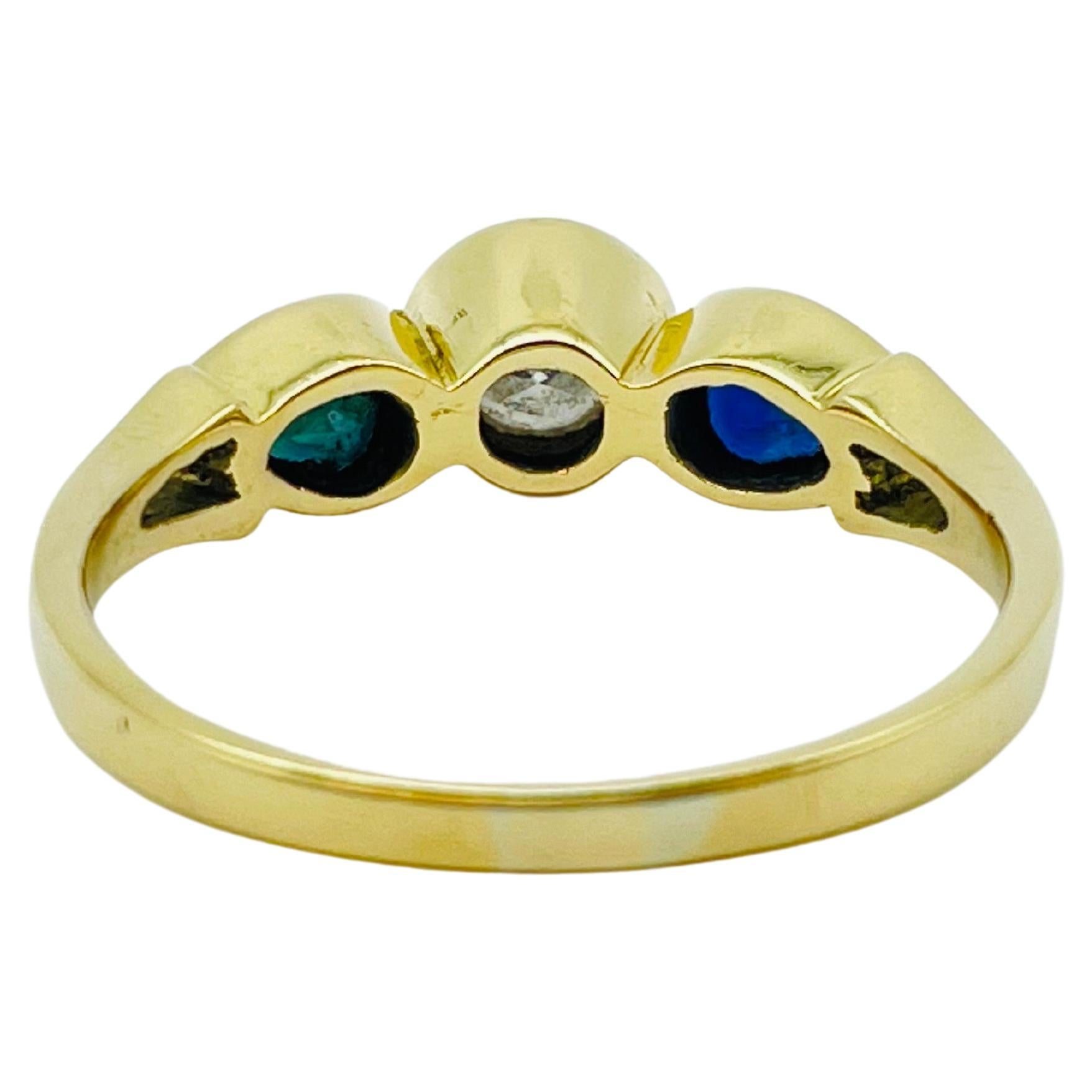 Beautiful yellow gold ring 0.60carat diamond, 2 blue sapphire teardrops In Good Condition For Sale In Berlin, BE