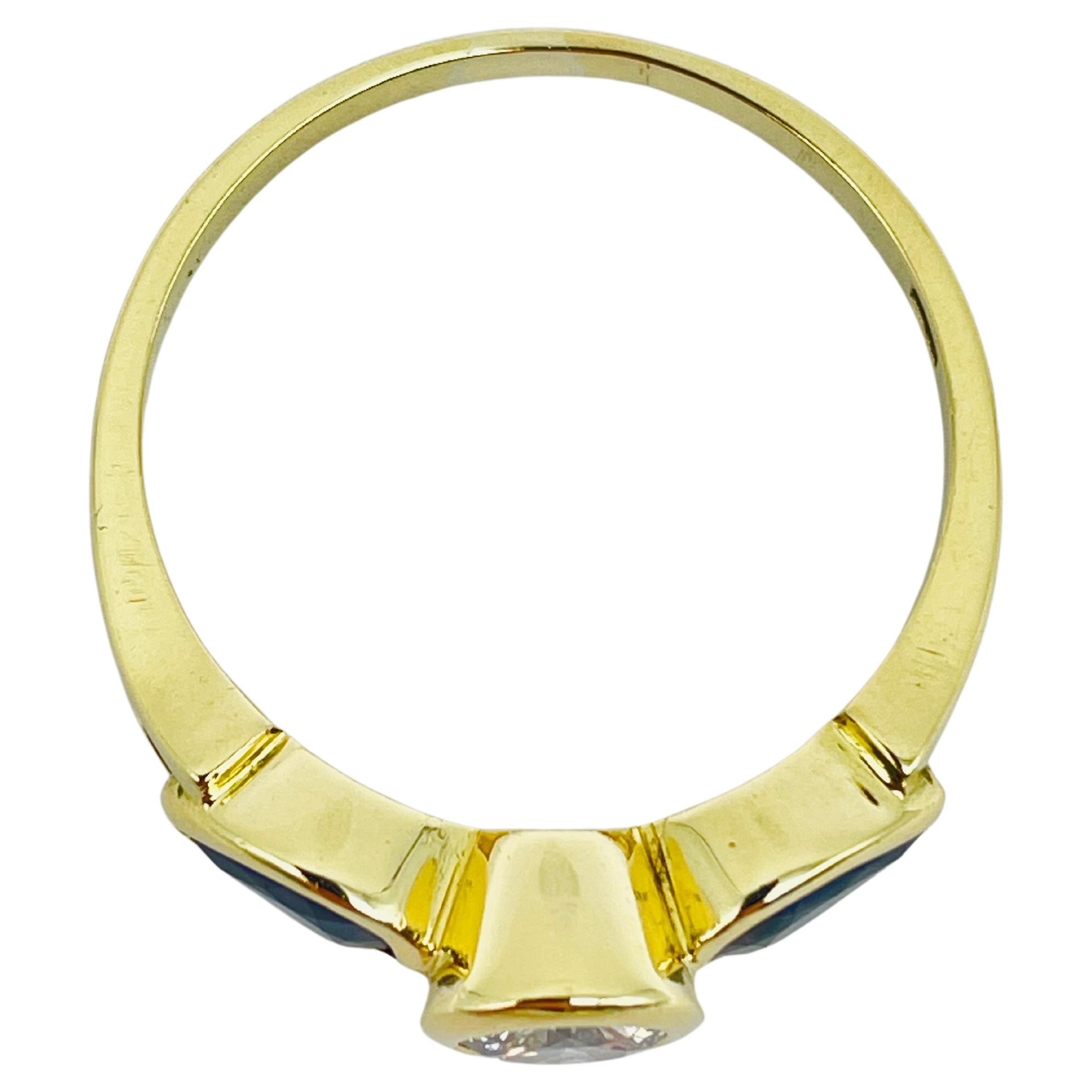 Women's or Men's Beautiful yellow gold ring 0.60carat diamond, 2 blue sapphire teardrops For Sale