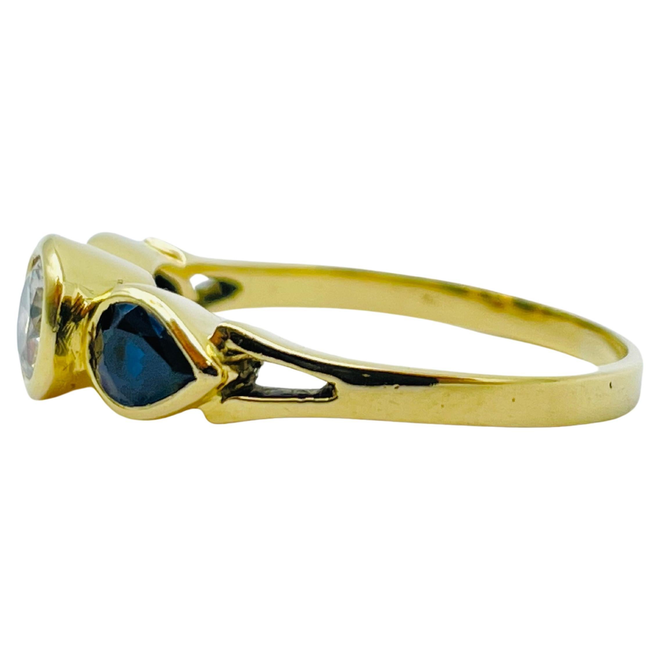 Beautiful yellow gold ring 0.60carat diamond, 2 blue sapphire teardrops For Sale 1