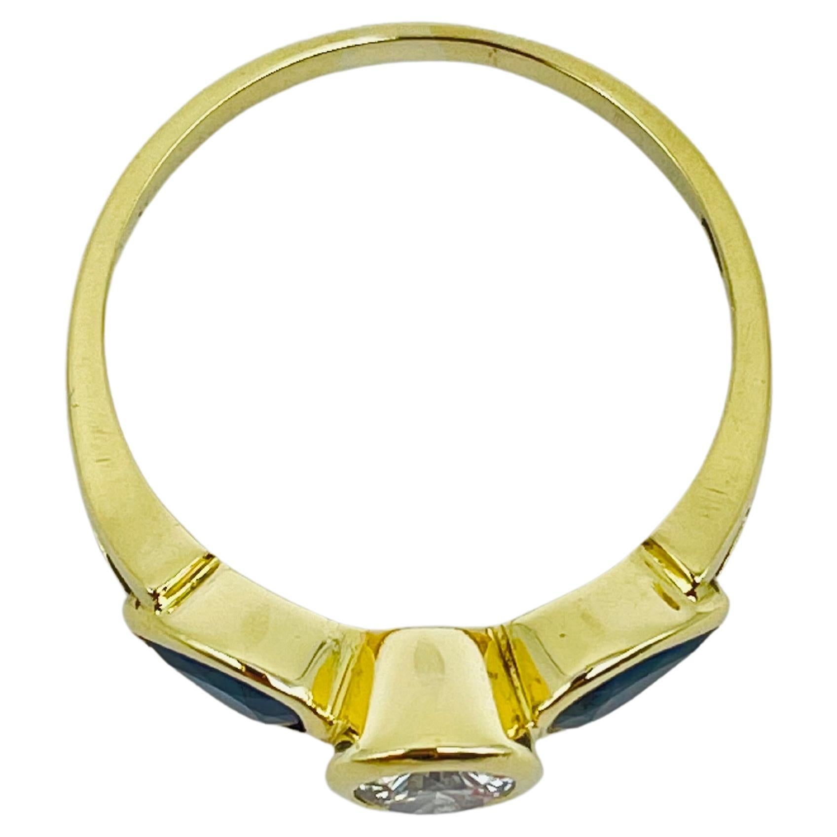 Beautiful yellow gold ring 0.60carat diamond, 2 blue sapphire teardrops For Sale 2