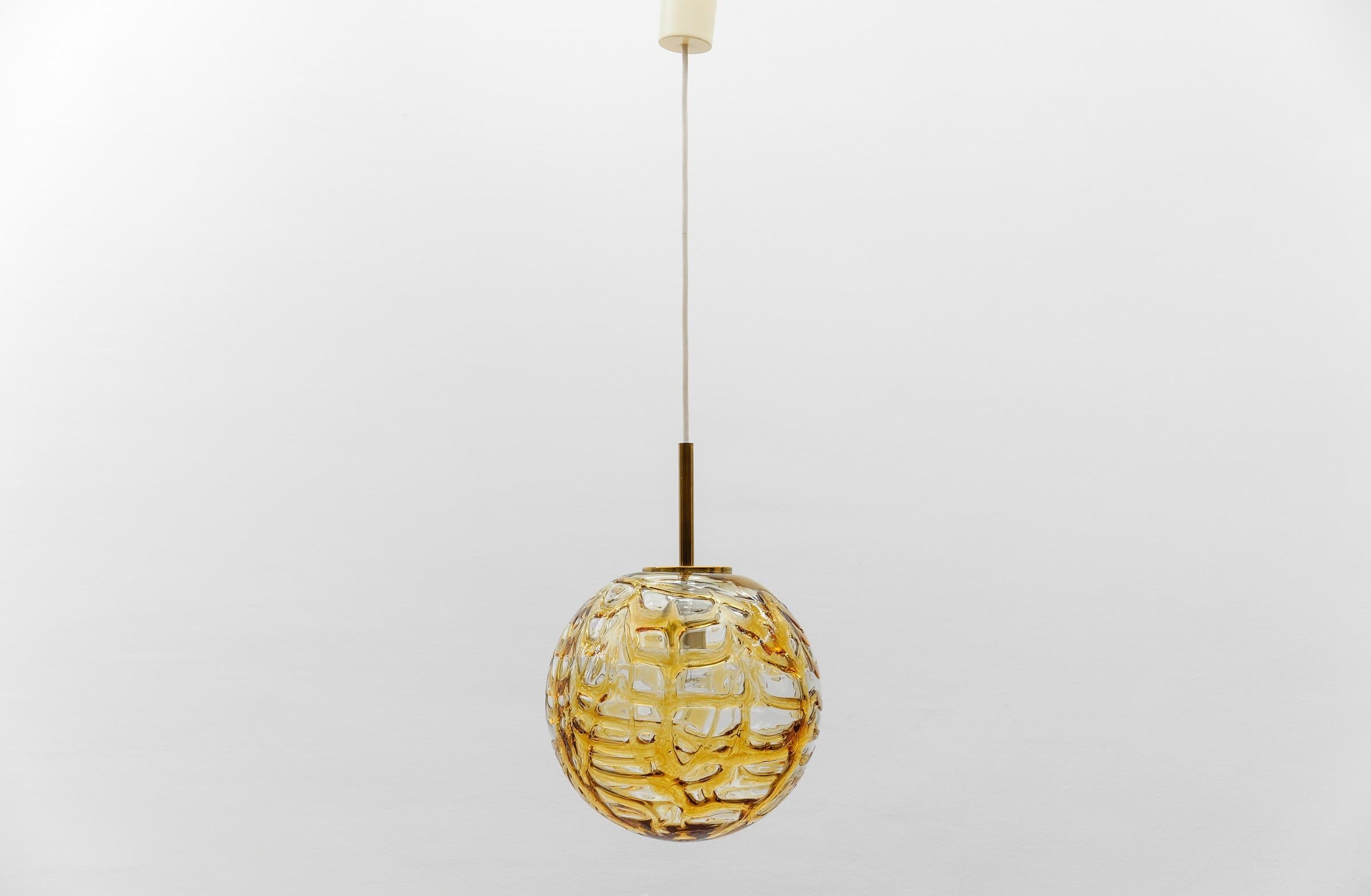 Lovely Yellow Murano Glass Ball Pendant Lamp by Doria, - 1960s Germany

Dimensions
Diameter: 11.81 in. (30 cm)
Height: 41.33 in. (105 cm)

One E27 socket. Works with 220V and 110V.

Our lamps are checked, cleaned and are suitable for use in the USA.