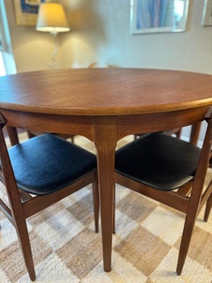 Beautiful yet simple mid century modern round dining table by Nathan Furniture