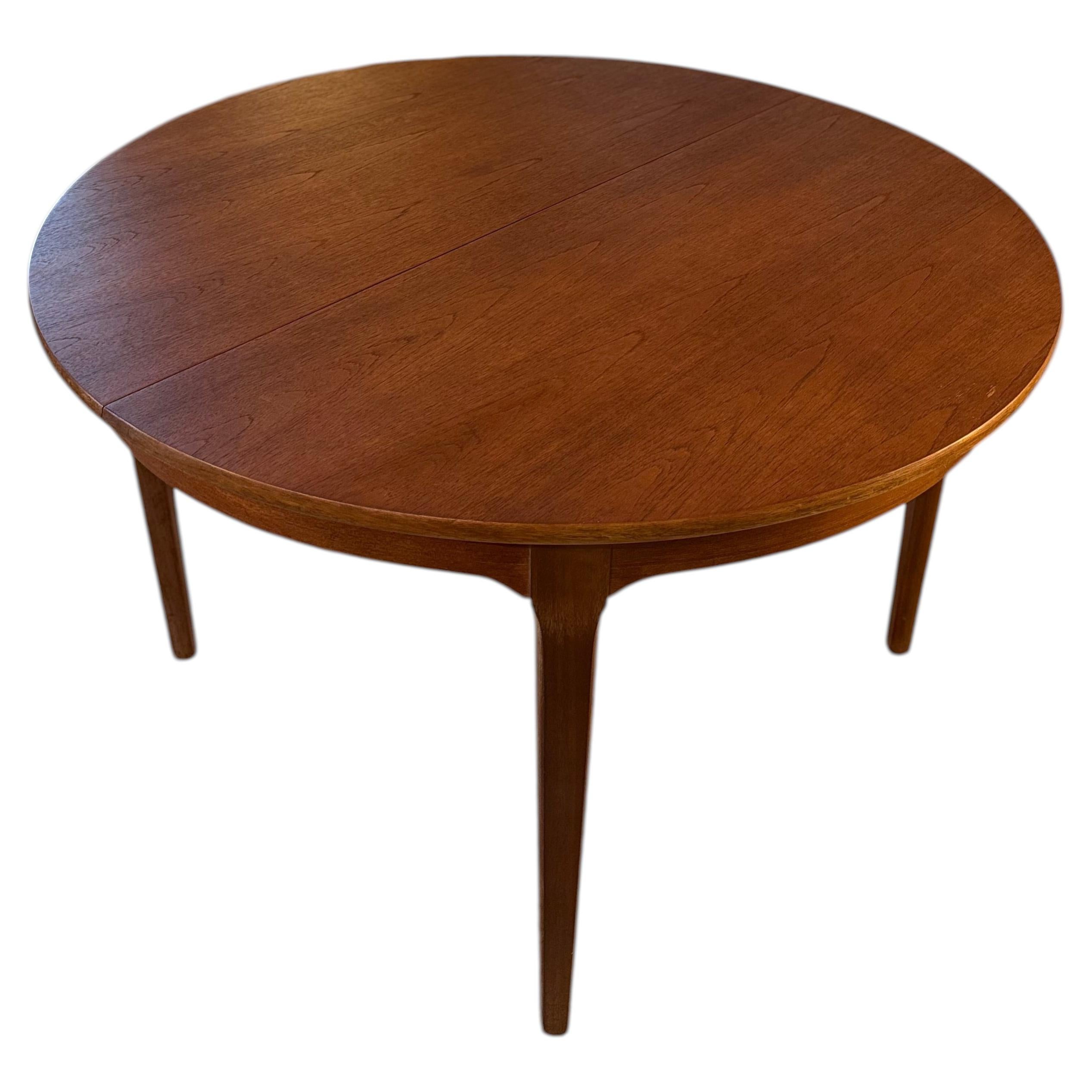 Beautiful yet simple mid century modern round dining table by Nathan Furniture