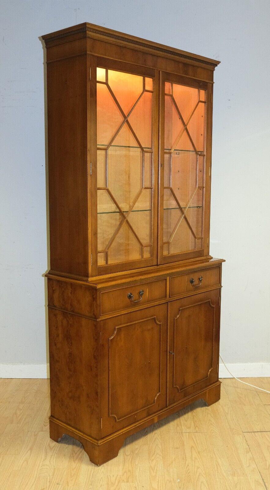 wooden display cabinet with glass doors and lights