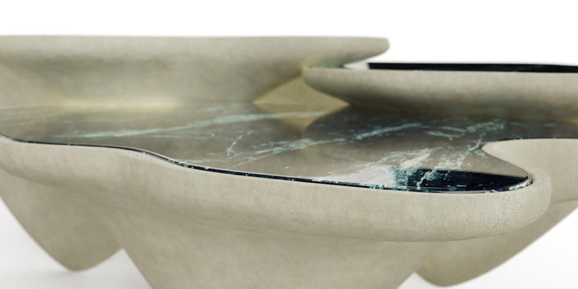 Designed to make an impression and deliver an unmatched experience, this exquisite coffee table will add a breathtaking touch of elegance and glamour to your luxury living room.

The tabletop is in Estremoz marble Ruivina with polished finish.