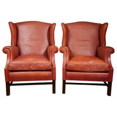 Beautifull Pair of Scandinavian Leather "Cognac" Color Wingback Armchairs