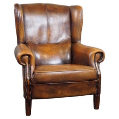 Beautifully colored and comfortable sheepskin leather wing chair