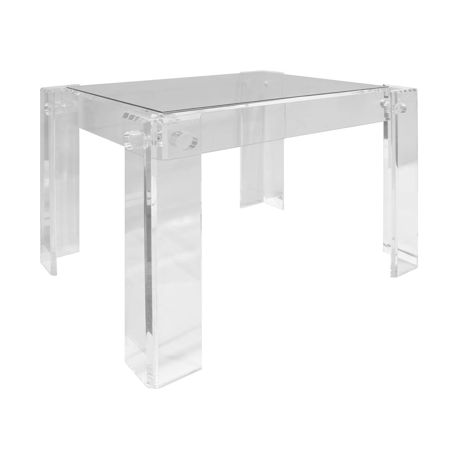 Beautifully crafted rectangular side table in thick Lucite with inset glass top, American, 1970s.