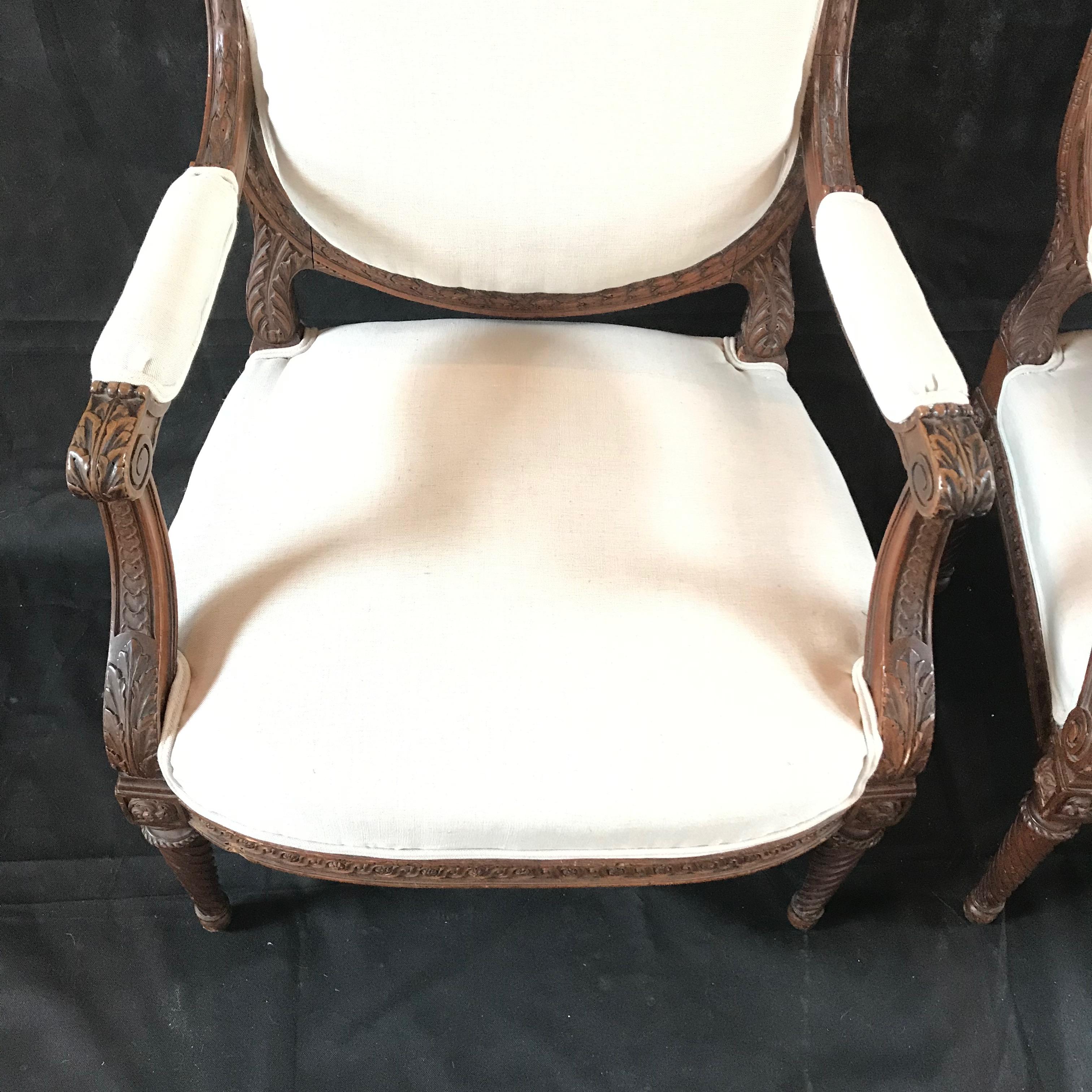 19th Century  Beautifully Detailed Pair of French Carved Walnut Armchairs