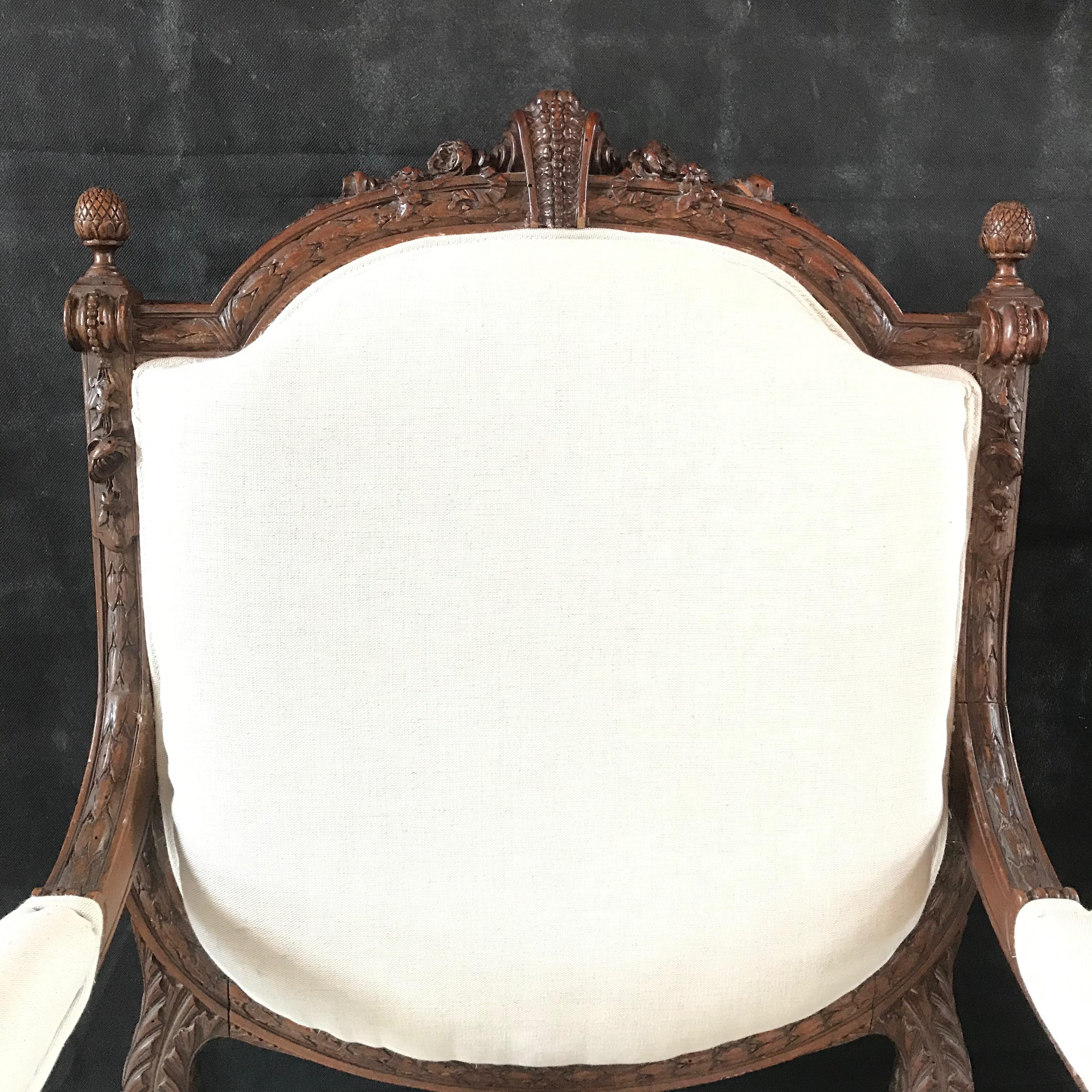  Beautifully Detailed Pair of French Carved Walnut Armchairs 1