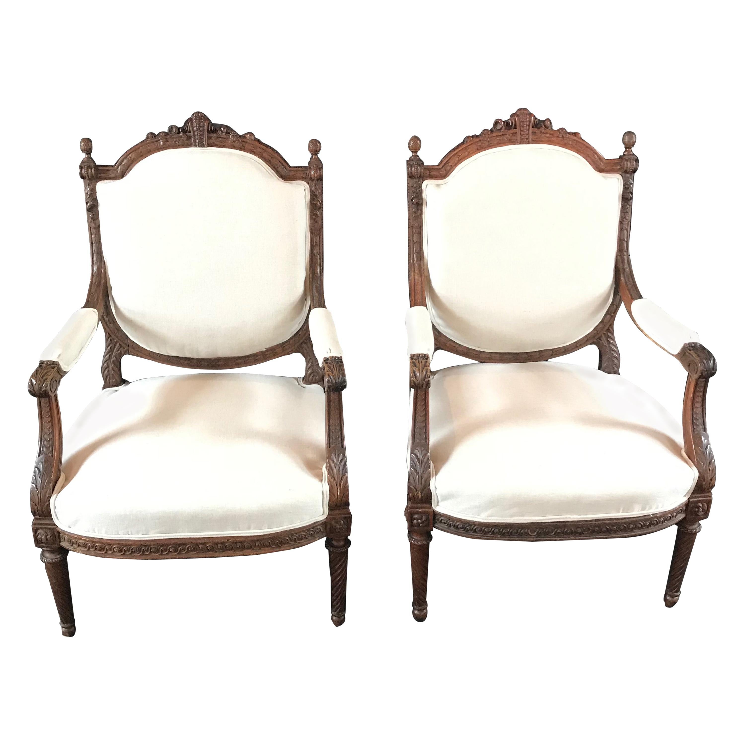  Beautifully Detailed Pair of French Carved Walnut Armchairs