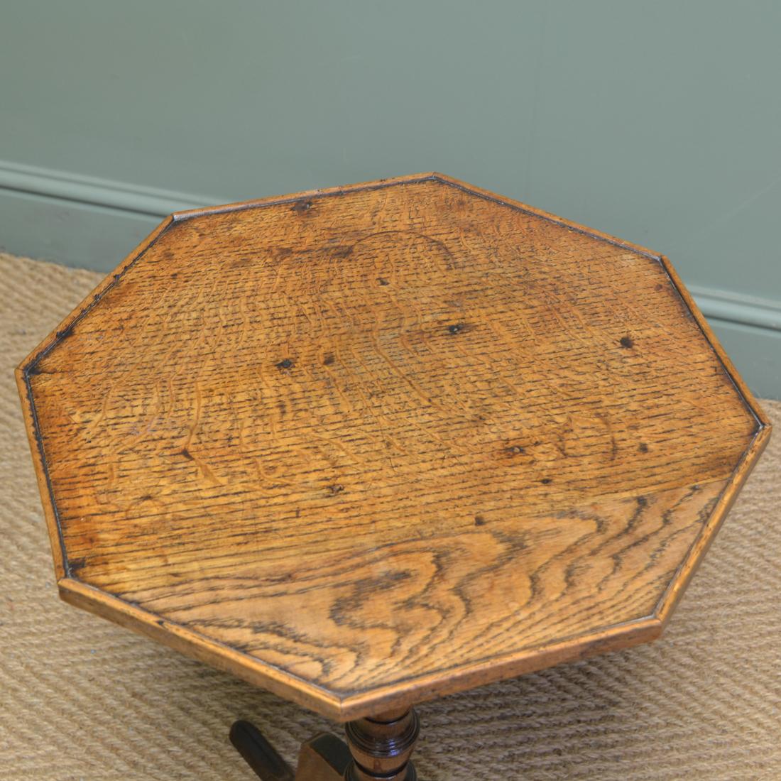 Beautifully figured Regency oak antique occasional table.

This beautifully figured Regency oak antique occasional table, circa 1830 is full of beautiful charm and character. With an octagonal figured top above an elegant central turned pedestal
