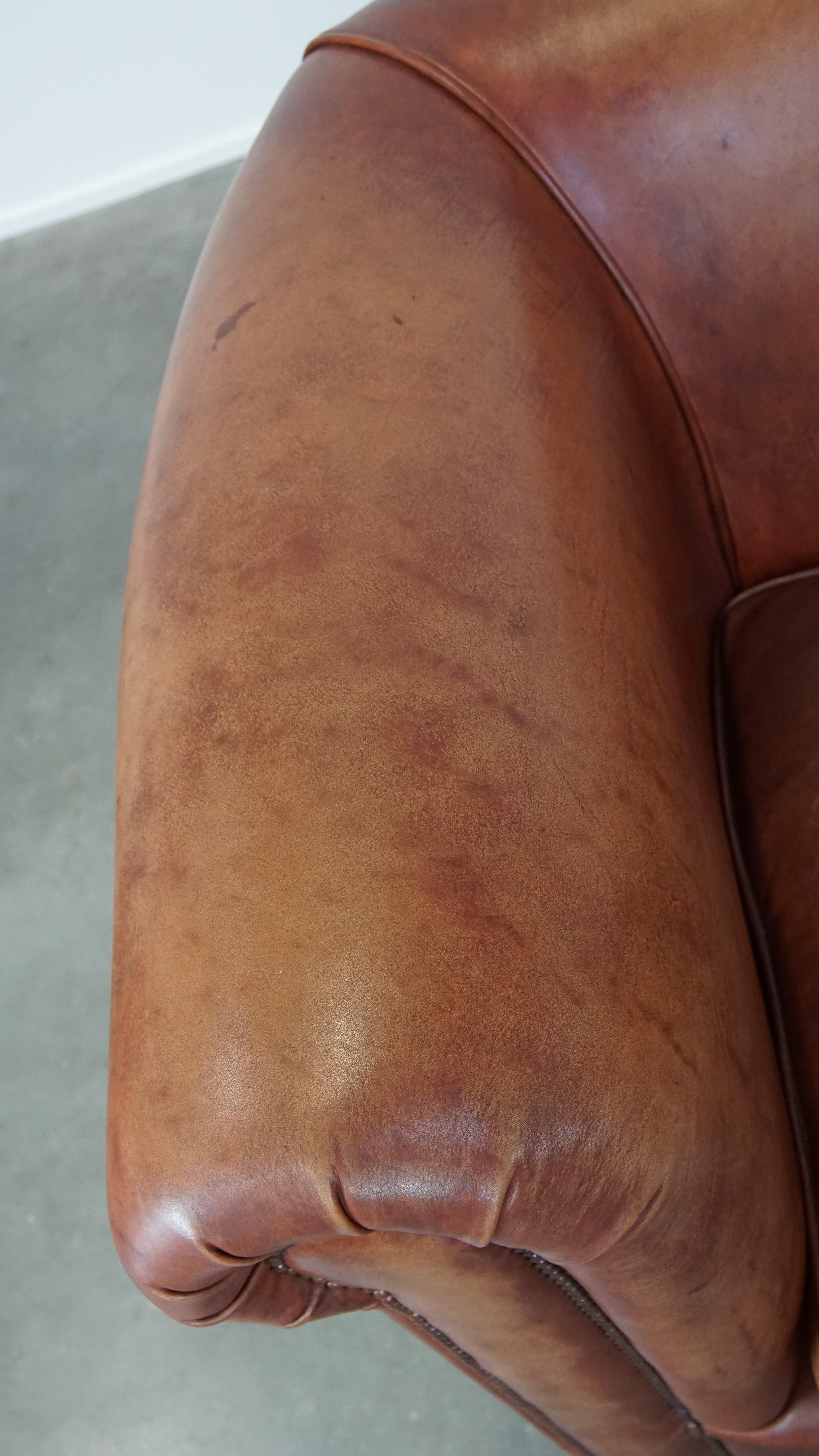 Beautifully finished spacious 3-seater sofa, cognac-colored cowhide leather 1