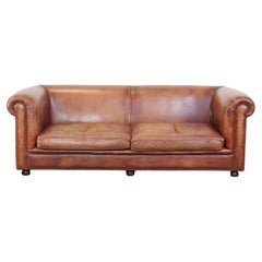 Beautifully finished spacious 3-seater sofa, cognac-colored cowhide leather