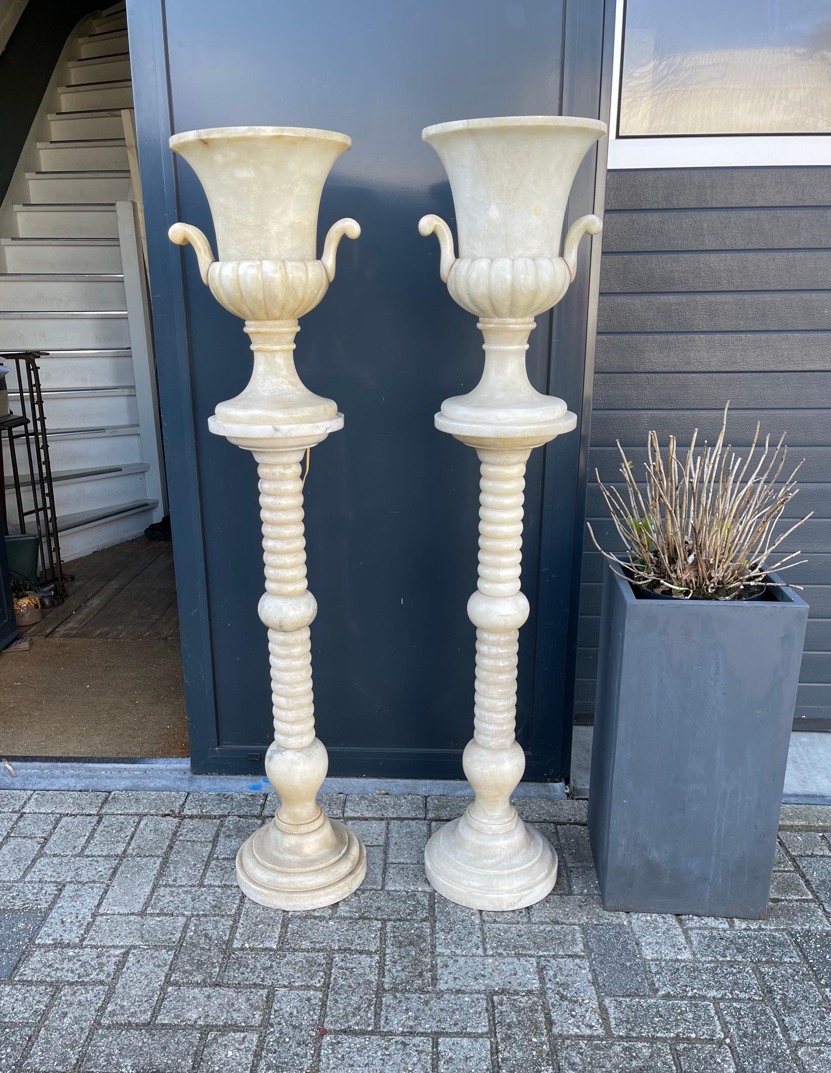 Timeless design Classical pair of alabaster pedestals with vase design sideboard or table lamps 

Have you ever tried to hand carve a figure out of a piece of natural mineral stone? Only then can you really come close to having an IDEA of how