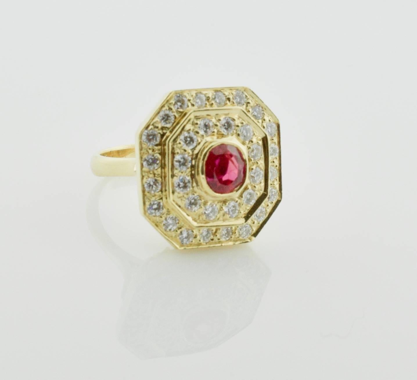 Beautifully Made Ruby and Diamond Ring in 18k Yellow Gold
One Oval Ruby weighing 1.16 carats [Bright Burma Color no imperfections visible to the naked eye
Thirty Two Round Brilliant Cut Diamonds weighing 1.30 carats [GH VVS-VS2]
Superb Wire Work on