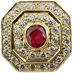 Bague magnifiquement réalisée en or jaune 18 carats avec rubis et diamants