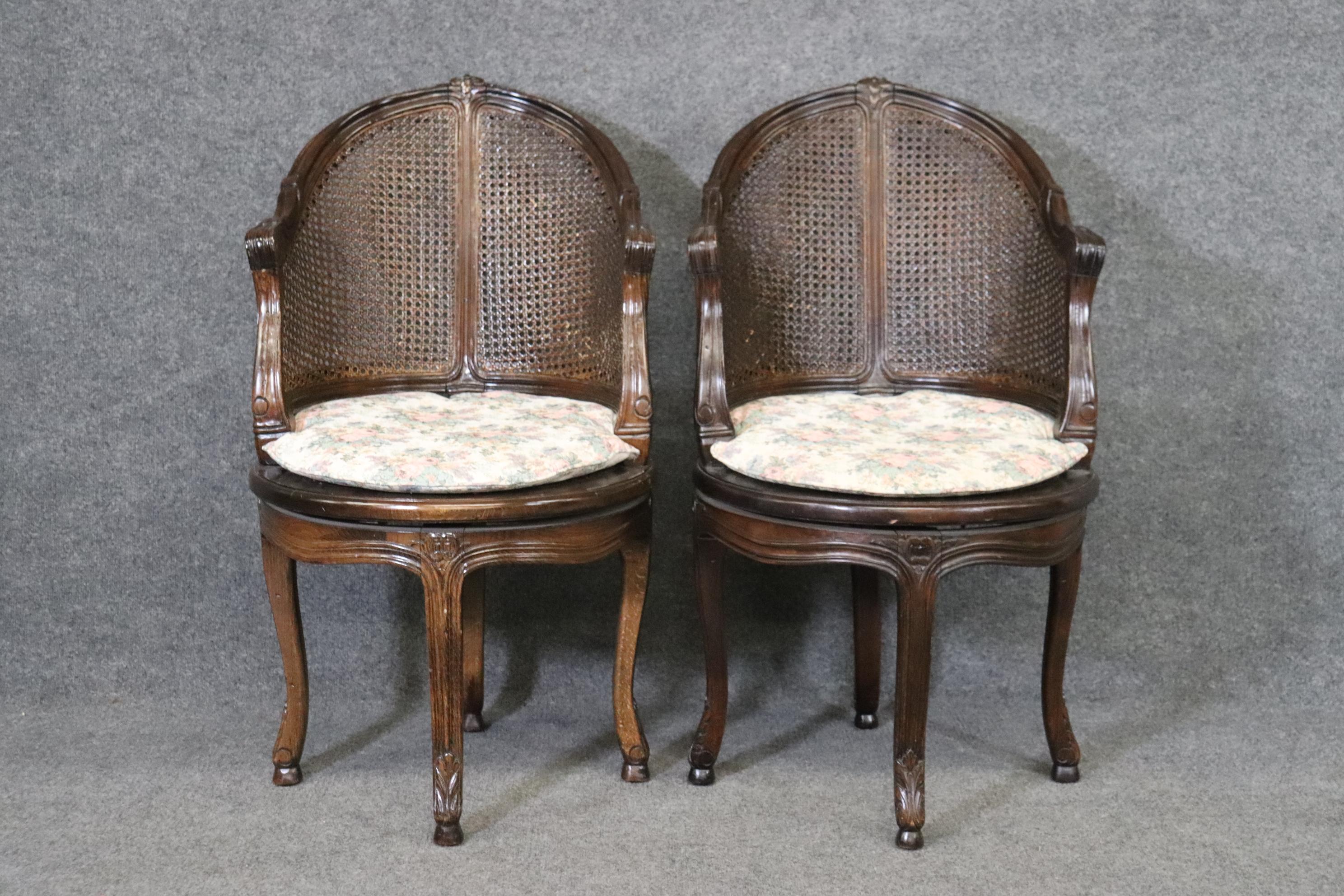 Louis XV Beautifully Pair of Dark Walnut Cane back and Seated Swiveling Corner Chairs