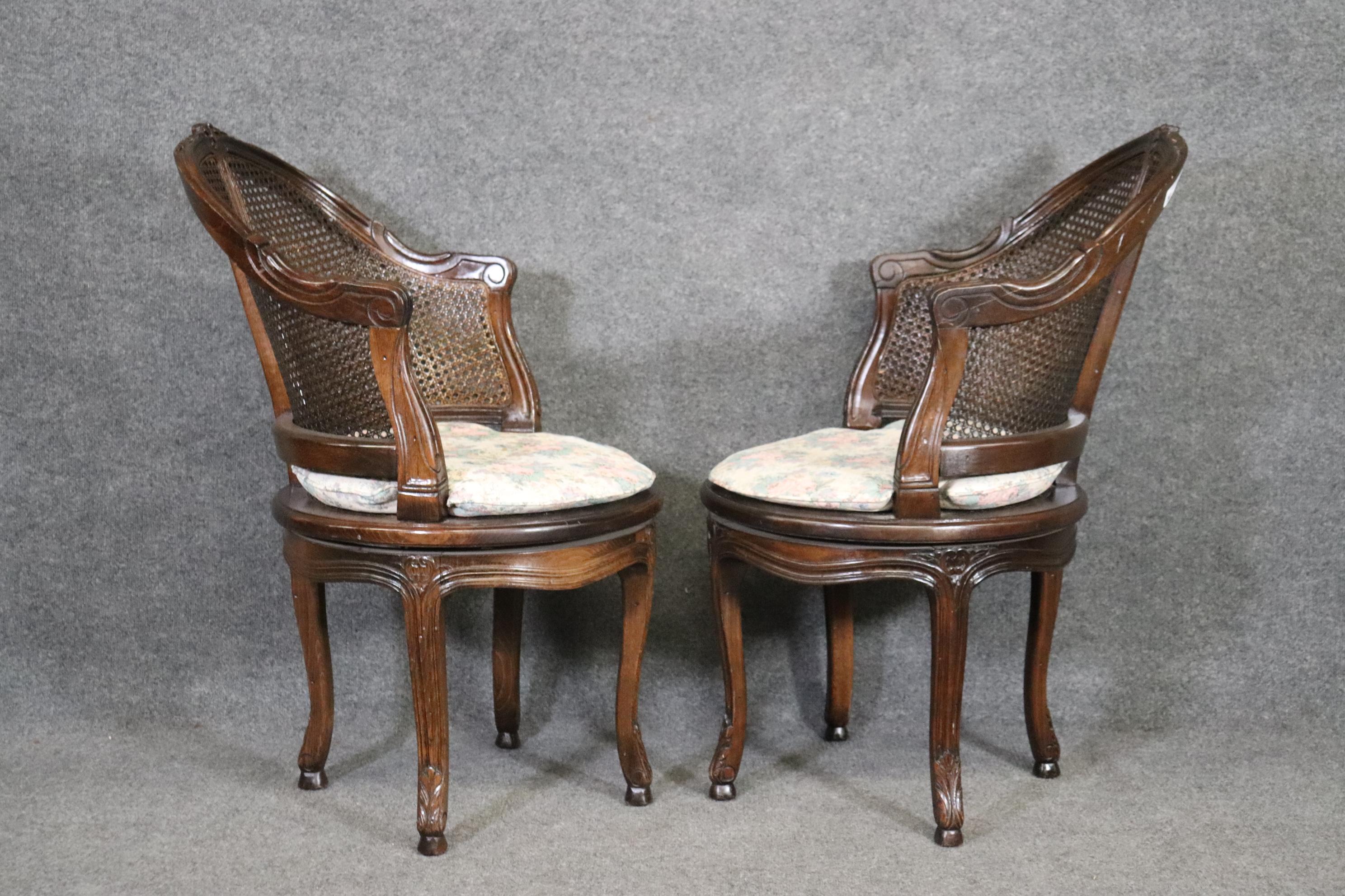 French Beautifully Pair of Dark Walnut Cane back and Seated Swiveling Corner Chairs
