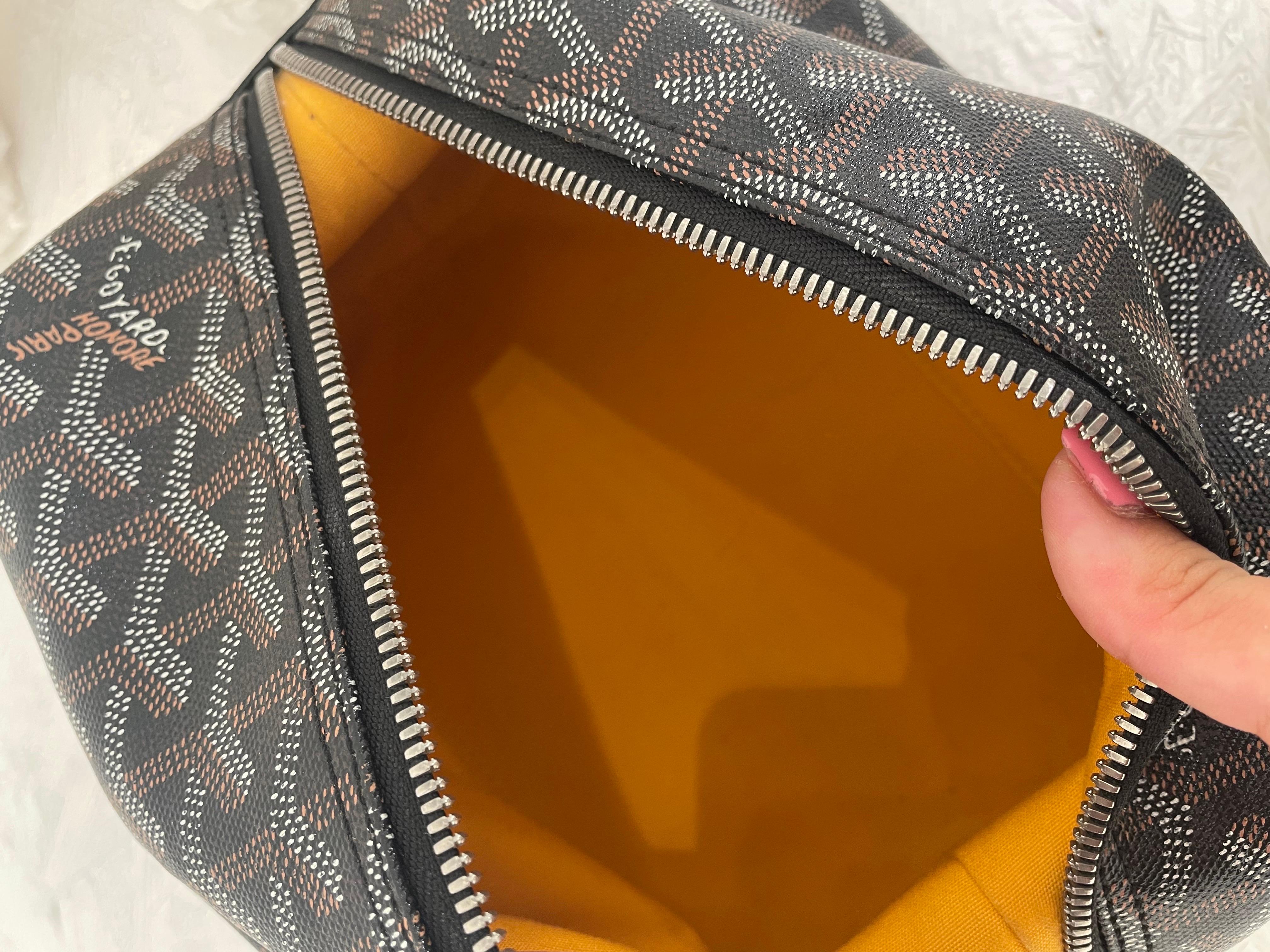 Beauty Goyard with classic pattern and black leather details 1