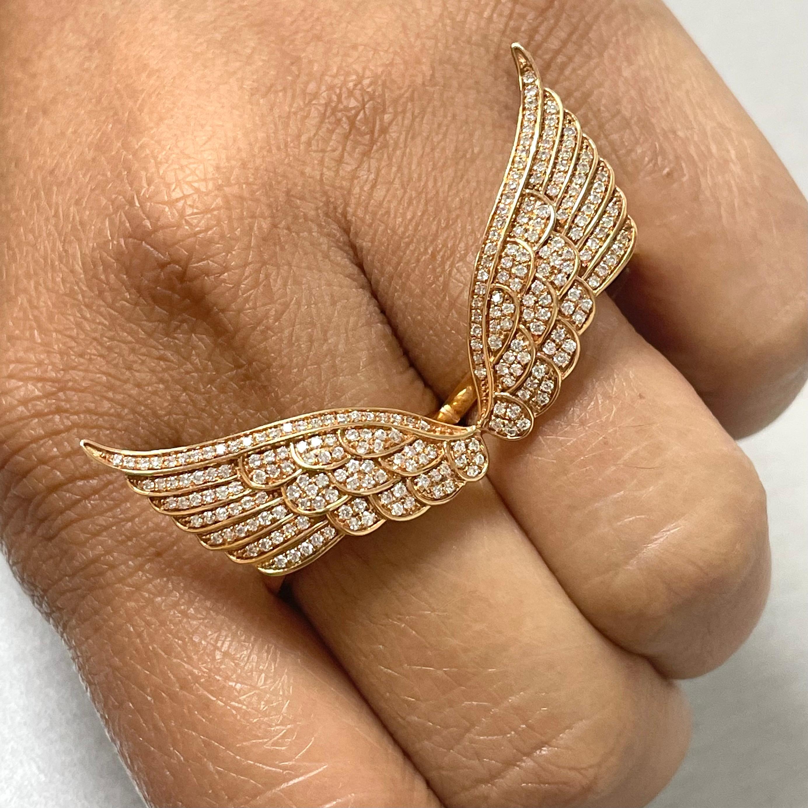 The Diamond and Rose Gold Wings Ring is a cool and funky expression of style and playfulness.

Diamonds Shape: Round
Diamonds Weight: 0.86 ct
Diamond Color: G - H
Diamond Clarity: VS - SI (Very Slightly Included - Slightly Included)

Metal: 18K Rose