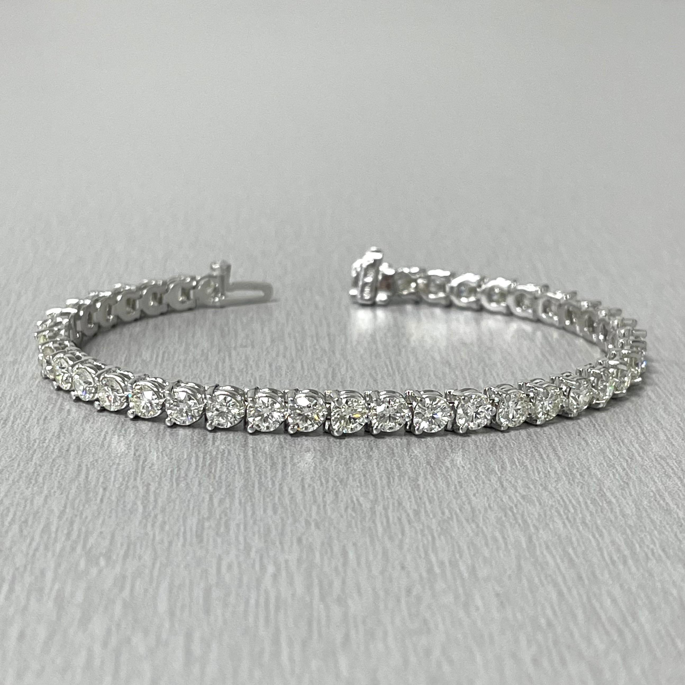 Beauvince 3 Prong Diamond Tennis Bracelet (10.47 ct Diamonds) in Platinum In New Condition For Sale In New York, NY