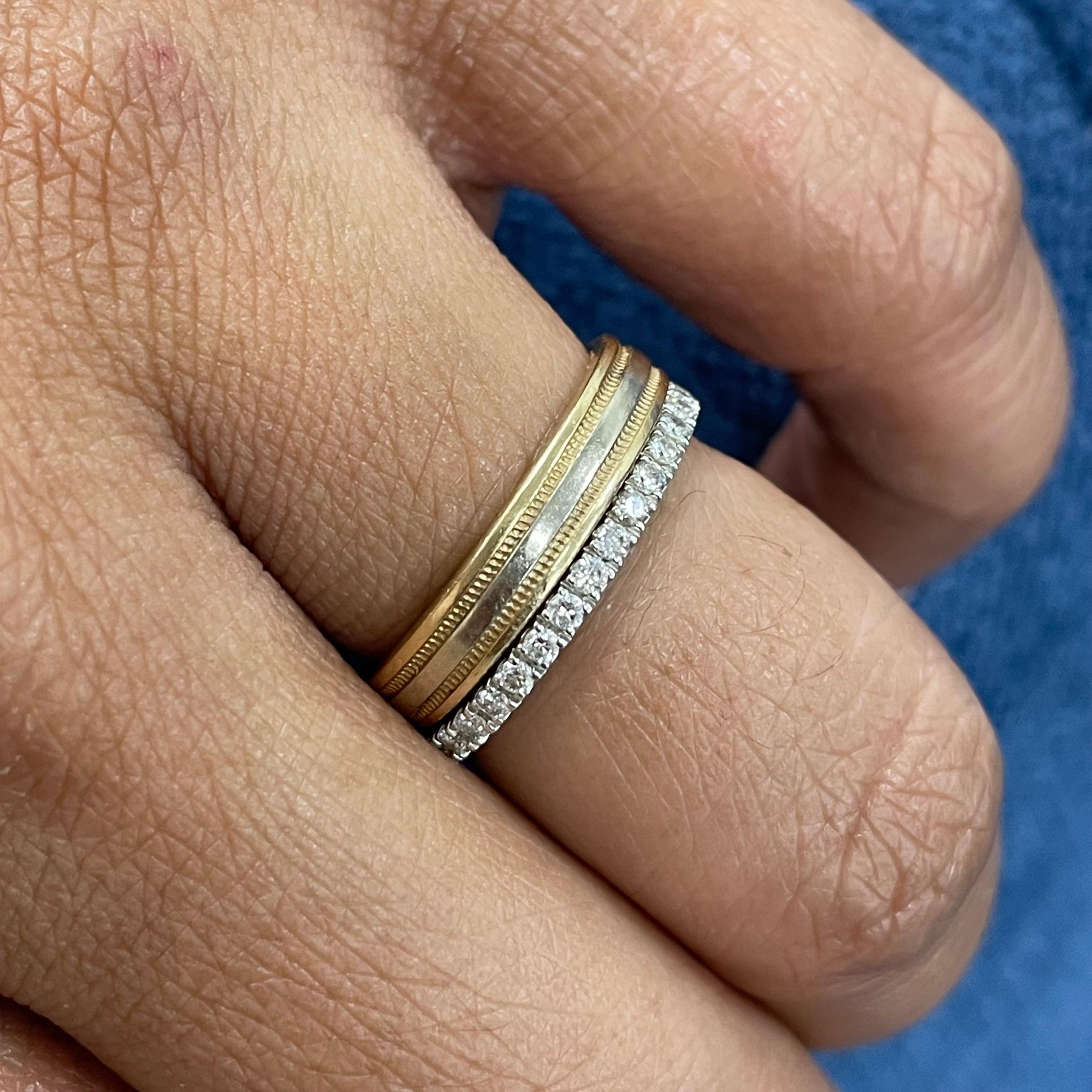 This classic and timeless diamond almost eternity band is just shy of an Eternity Ring leaving a short metal shank (approximately 12 mm in length) at the base of the finger so that the ring may be easily sized. It is delicate yet  gorgeous on it's