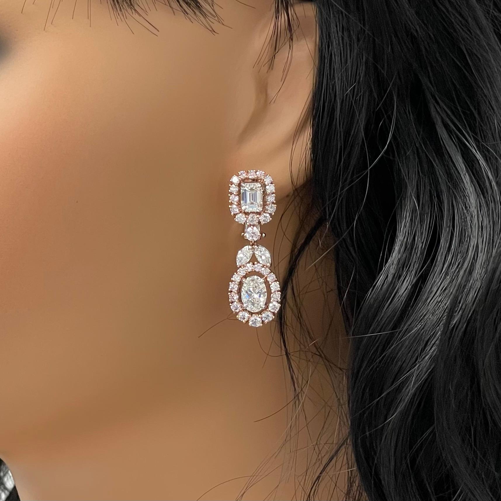 A sensual and dazzling combinations of natural pink diamonds with white marquise, emerald cut and oval shapes enables these stunning earrings to make a statement and impress with their simplicity. Showcasing 4 GIA certified and matched EF color IF -
