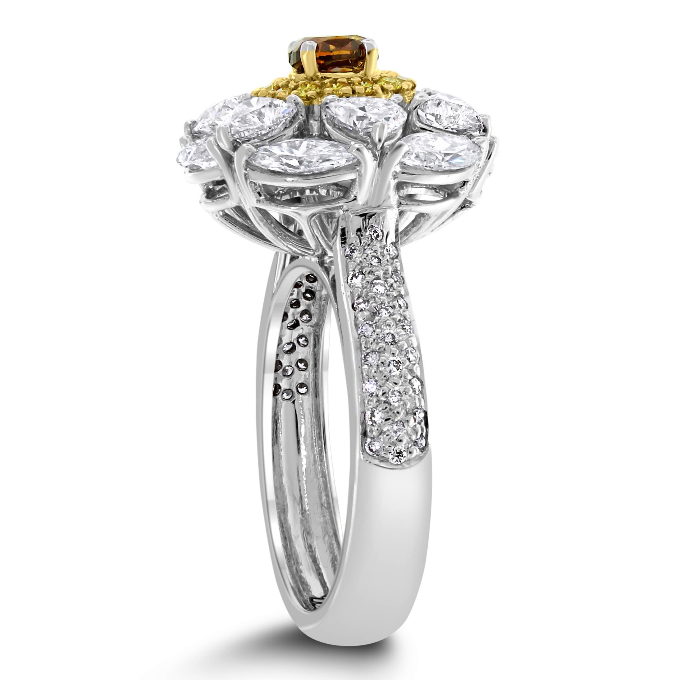 Der Ballerina Champagne ist ein klassischer Cocktail-Diamantring, der die elegantesten Formen und Farben von Diamanten vereint

Form des zentralen Diamanten: Oval
Gewicht des zentralen Diamanten: 0,32 ct 
Farbe des Diamanten: Orangy Brown
Diamant