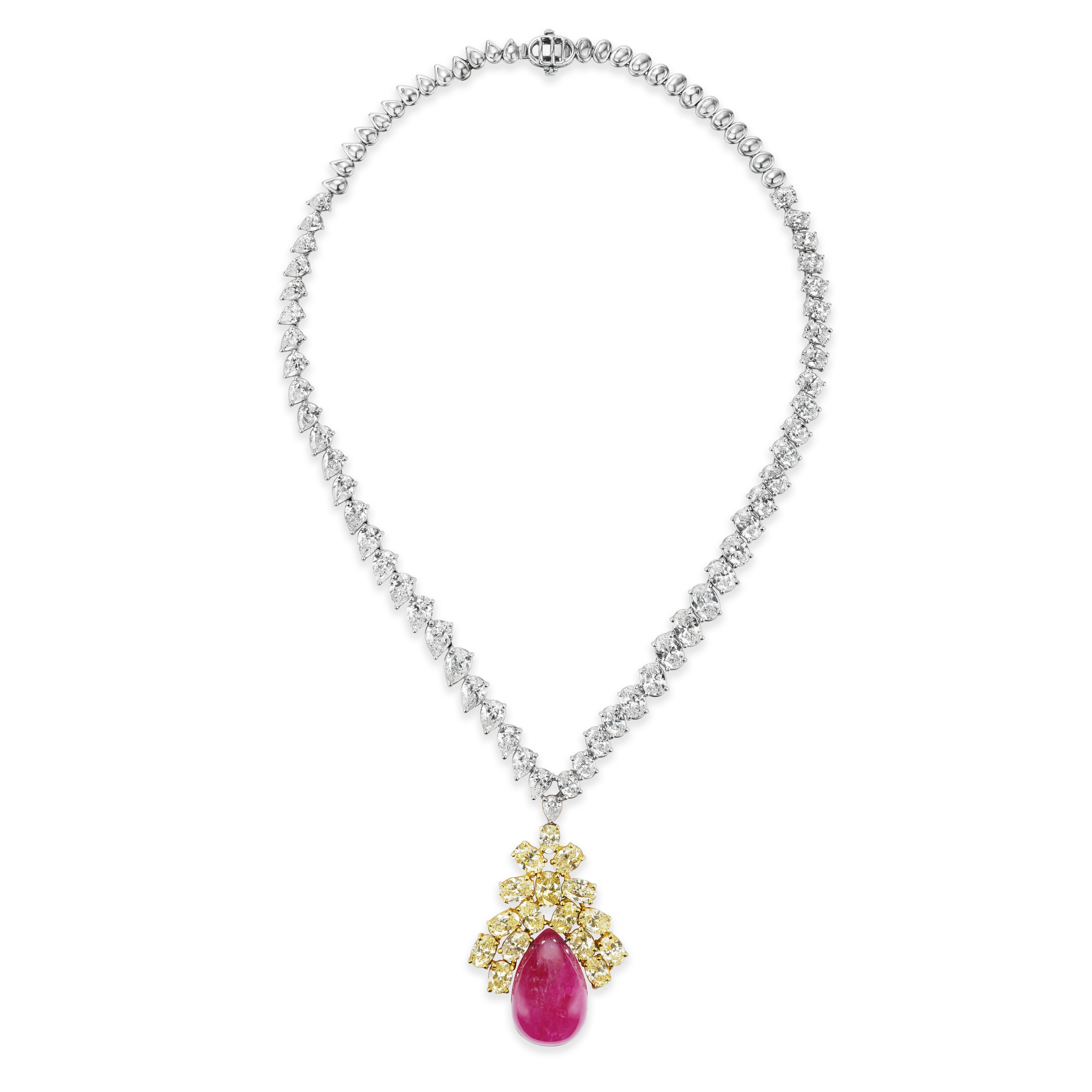 A lovely combination or colors, this necklace features fancy yellow and white diamonds alongside a set of exquisite and rare large ruby cabochons. The parure is glamorous and drool-worthy with its uniqueness and rarity.

Gemstones Type: Natural Ruby