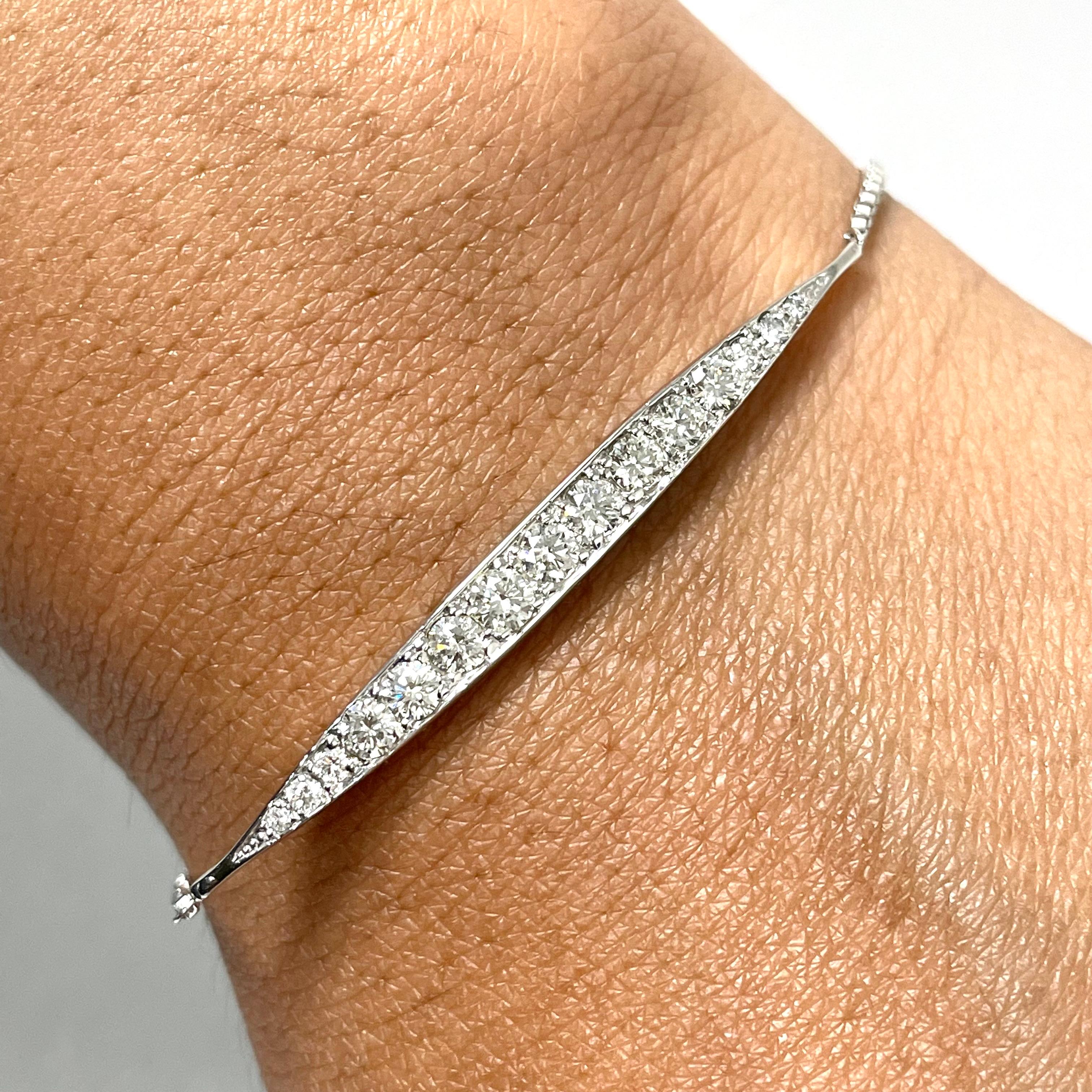 Always a fun accessory, the Bolo bar bracelet adds sparkles and shine to every look.

Diamonds Shape: Round
Total Diamond Weight: 0.96 ct 
No. of Diamonds: 15
Diamond Color: G - H 
Diamond Clarity: VVS - VS (Very Very Slightly Included - Very