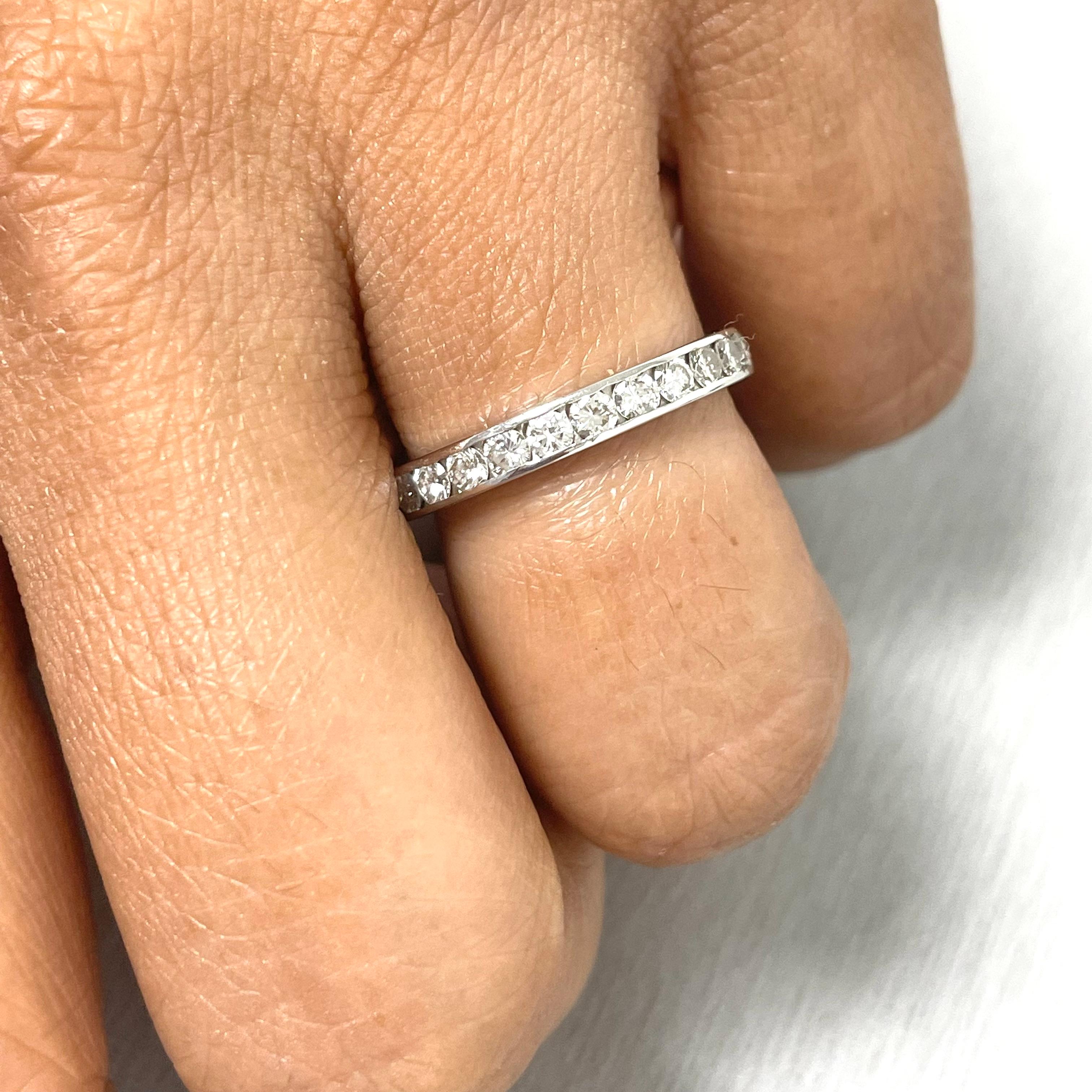 The channel set eternity diamond band offers both the bling and a charisma that is slightly subdued. A classic style, it is comfortable and evergreen.

Total Diamond Weight: 1.30 ct
No. of Diamonds: 26
Diamond Color: G - H
Diamond Clarity: VS (Very