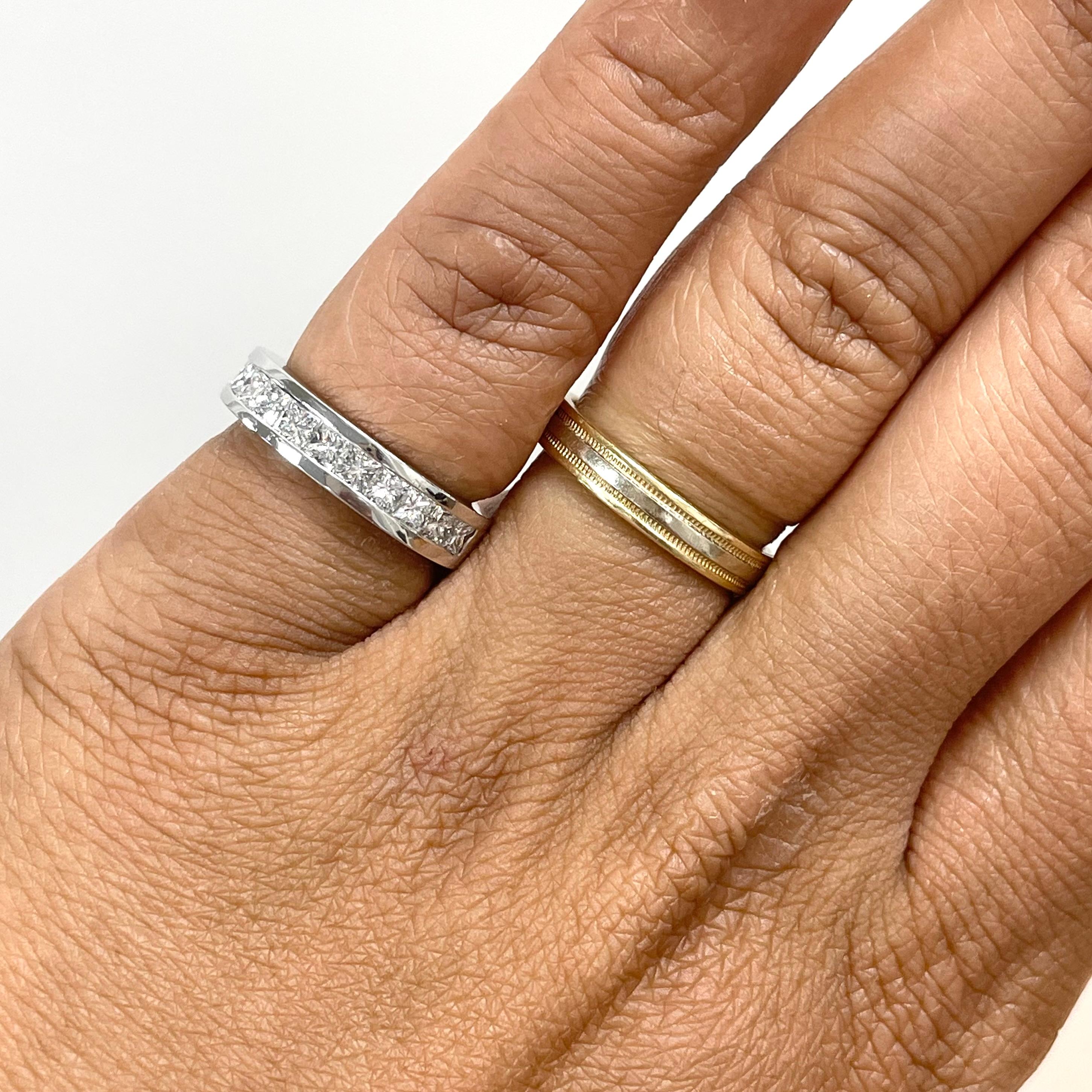 This half way Channel Set Diamond Band offers both the bling, and a charisma that is slightly subdued. A classic style, it is comfortable and evergreen. 

Total Diamond Weight: 1.25 ct
No. of Diamonds: 11
Diamond Color: F - G
Diamond Clarity: VVS