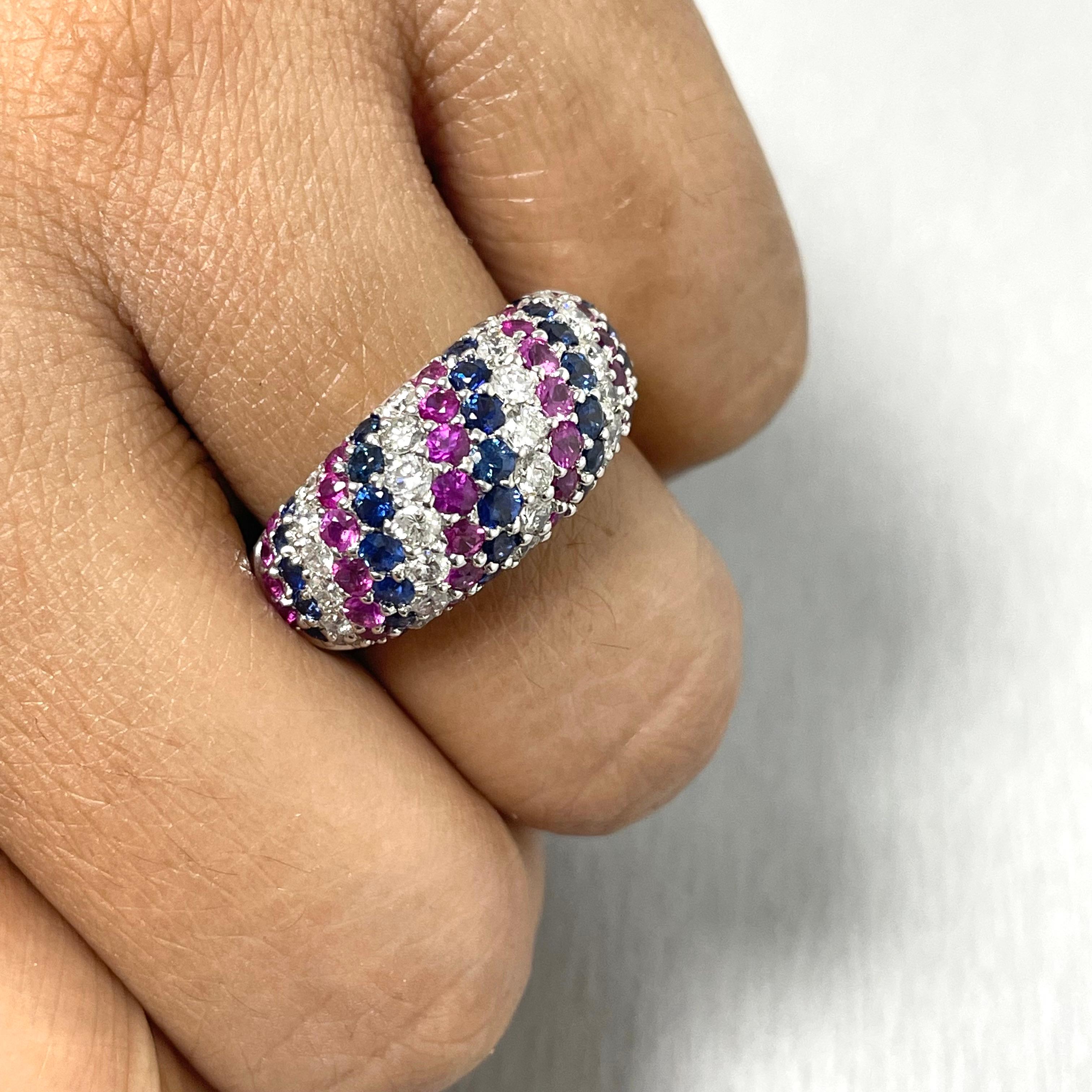 The Cynthia is a gorgeous, youthful colorful bubble band that makes a statement with its colors and boldness. With blue sapphires, pink rubies and stunning white diamonds, this band is everything one can ask for.

Total Diamond Weight: 0.88 ct