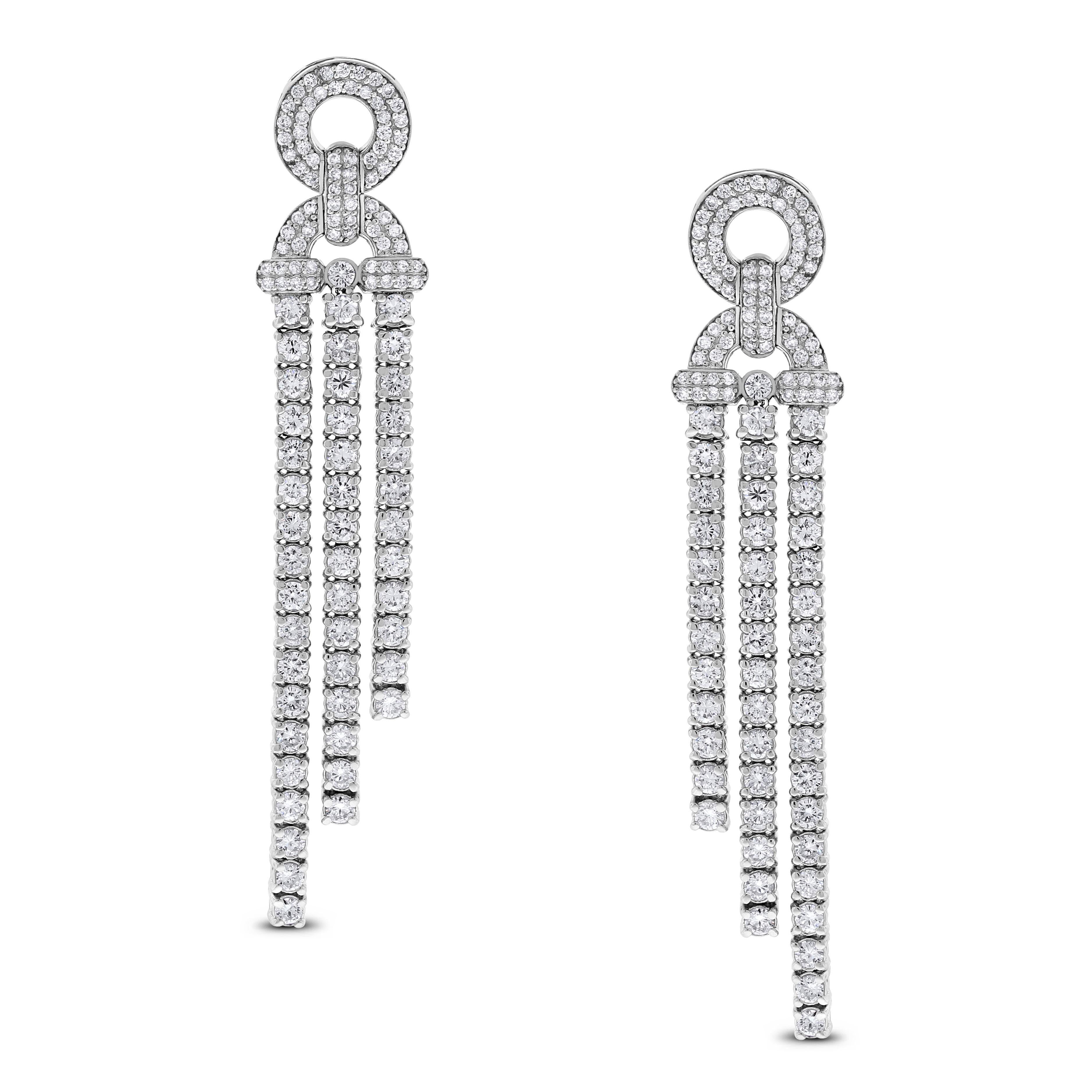 Regal in style and design, these diamond earrings are flowy and versatile making them the perfect pair for any outfit and any occasion. 

Diamonds Shape: Round 
Diamonds Weight: 4.31 ct 
Diamond Color: G - H 
Diamond Clarity: VS - SI (Very Slightly