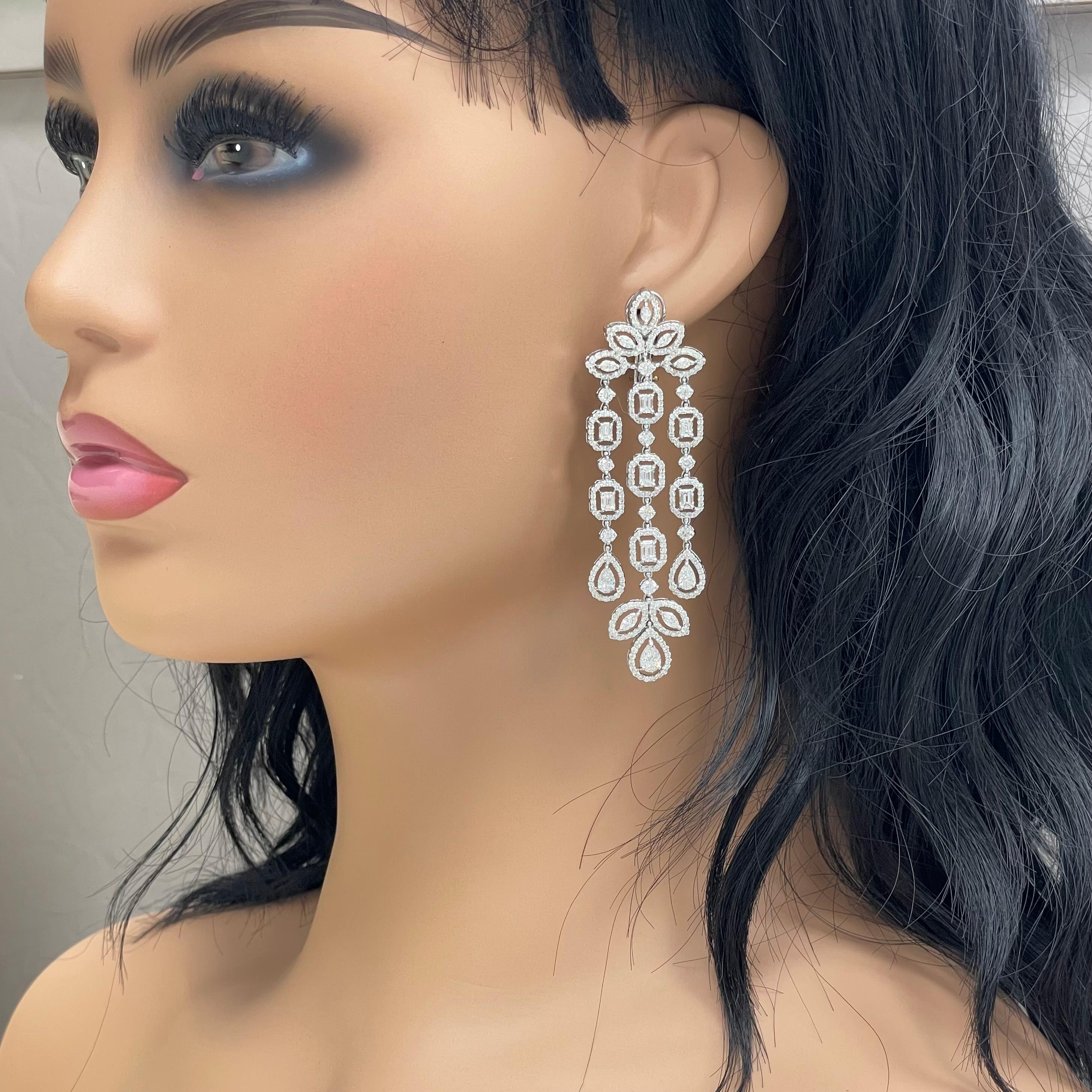 The Beauvince Legacy diamond earrings feature a important and emphatic design befitting a queen. The over-sized chandelier earrings are stated, royal & elegant. 

Diamonds Shapes: Pear Shape, Marquise, Emerald & Round 
Total Diamonds Weight: 8.55