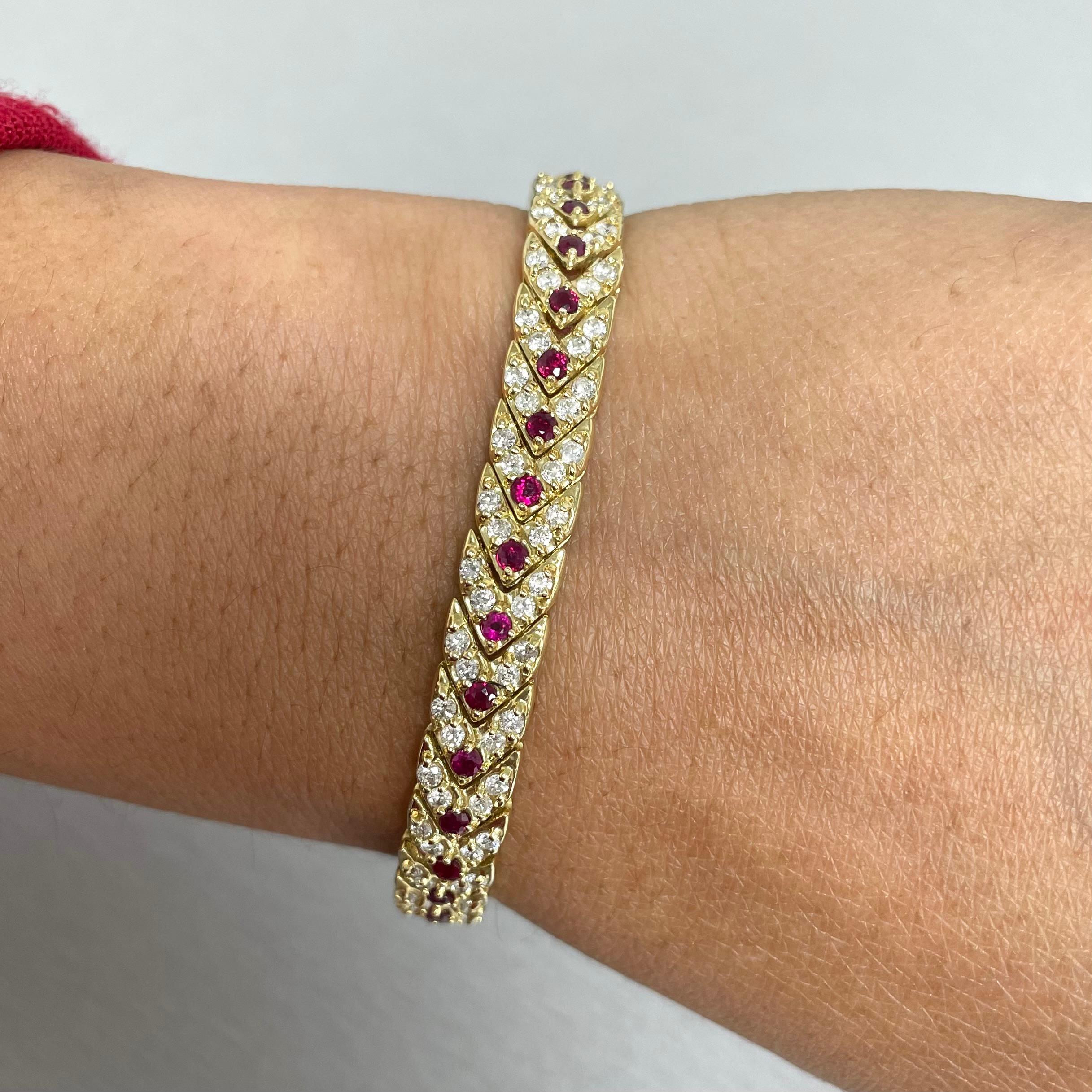 Traditional yet modern, this bracelet adds an elegant touch of color whether one is dressing casual or fancy. 

Gemstones Type: Ruby 
Gemstones Shape: Round 
Gemstones Weight: 1.10 ct 
Gemstones Color: Red 

Total Diamond Weight: 3.28 ct 
Diamond