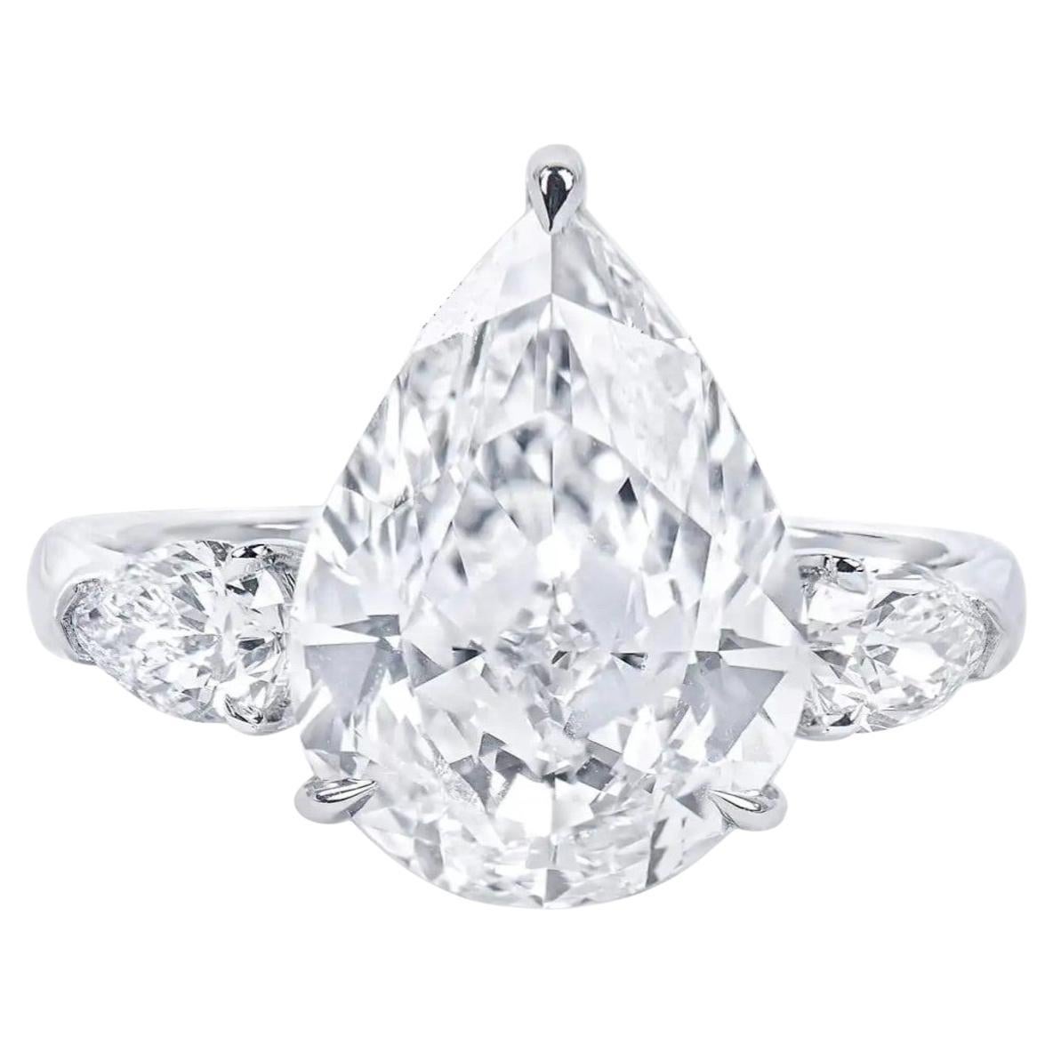 Beauvince Diva Pear Shape 3 Stone Engagement Ring (6.64 ct IVS2 IGI Diamond)